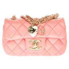 Chanel Mini Charms Shoulder bag in Pink quilted leather and gold hardware