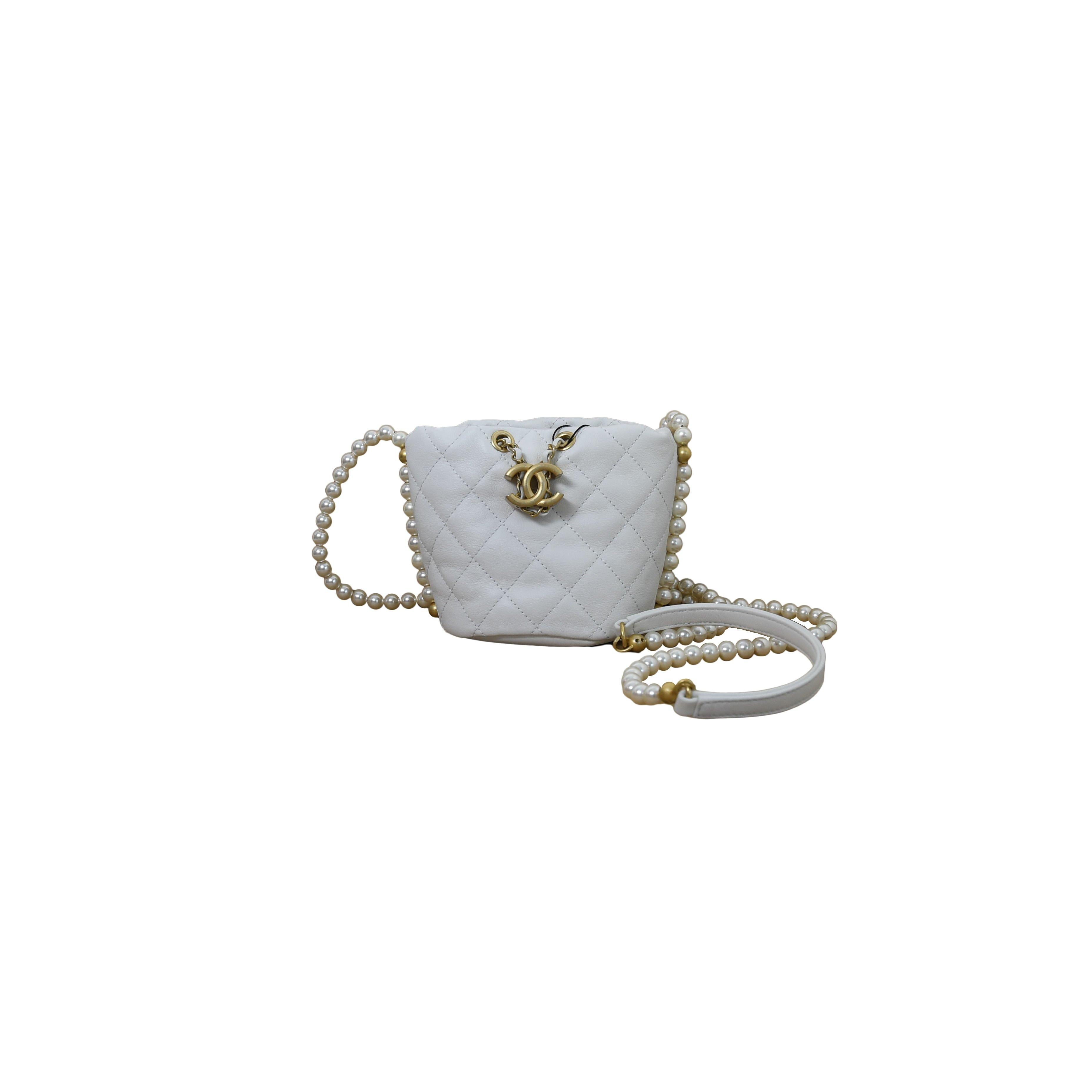 Chanel Mini Drawstring Bag Calfskin Pearl with Gold Metal White For Sale at  1stDibs