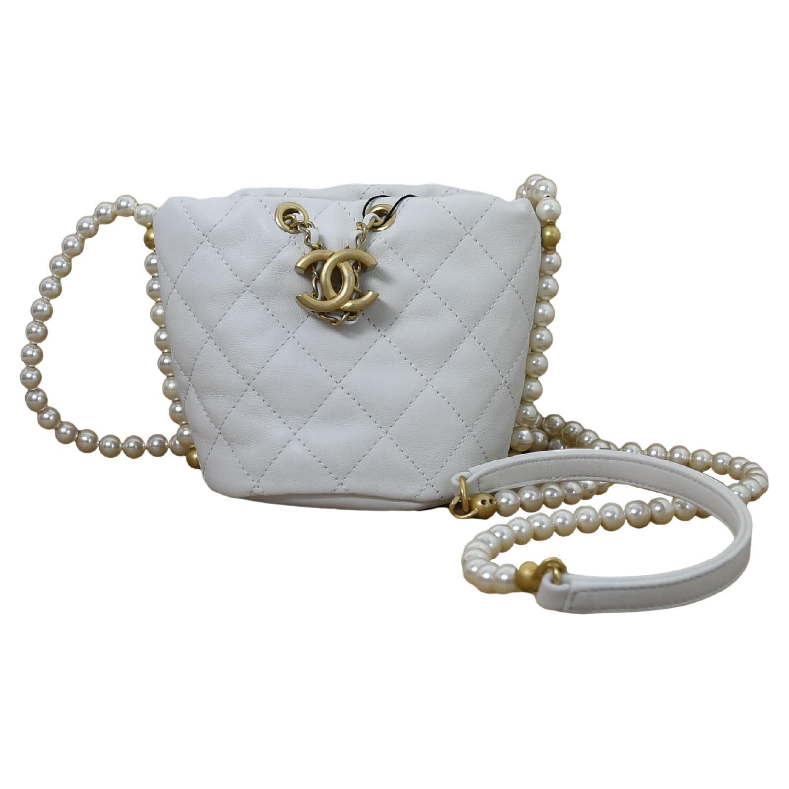 Chanel Mini Drawstring Bag Calfskin Pearl with Gold Metal White For Sale