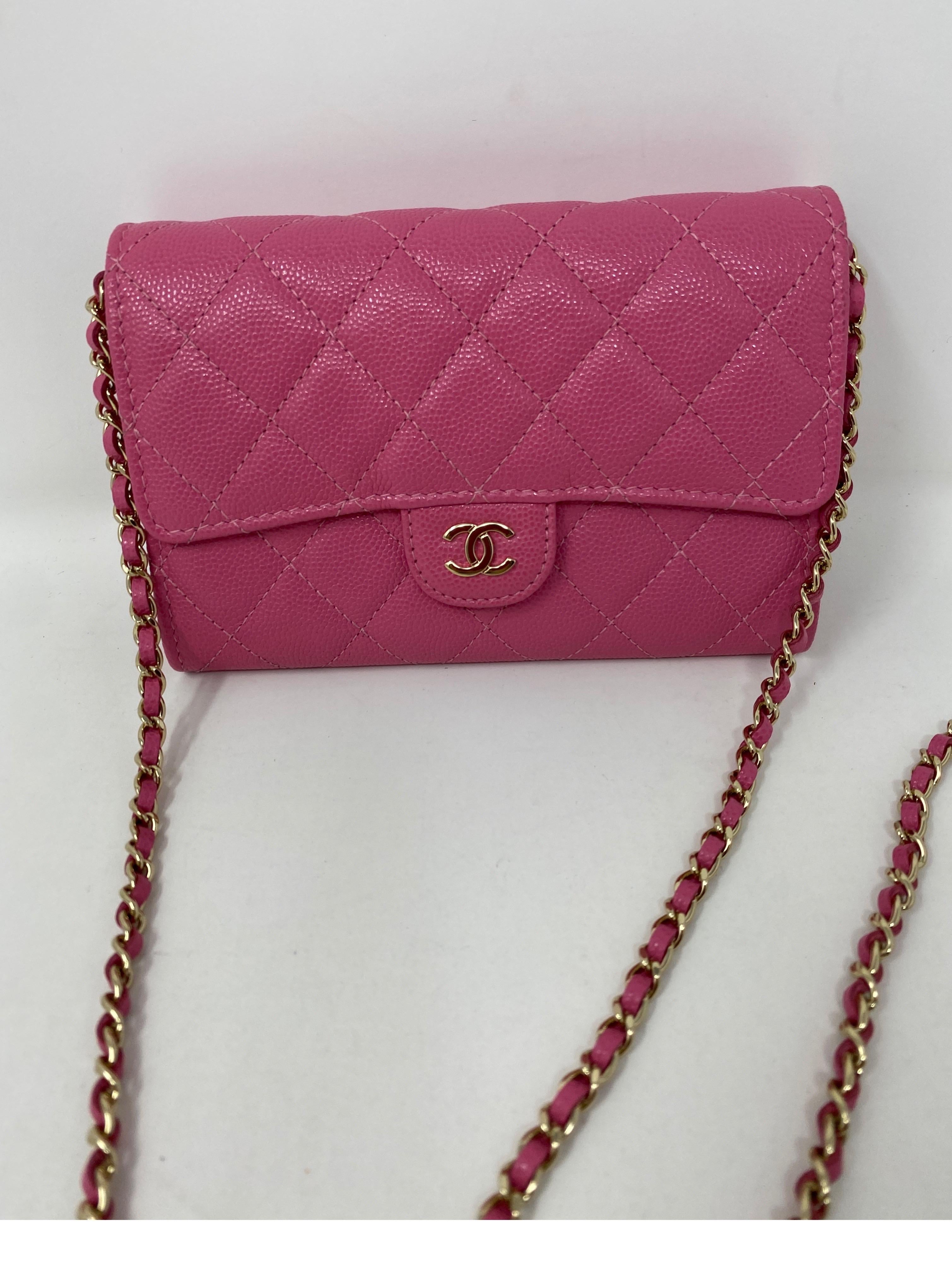 Chanel Mini Hot Pink Wallet On A Chain Bag. Pink caviar leather with gold hardware. Mint like new condition. Hard to find mini size. Collector's piece. Includes authenticity card, dust cover and box. Guaranteed authentic. 