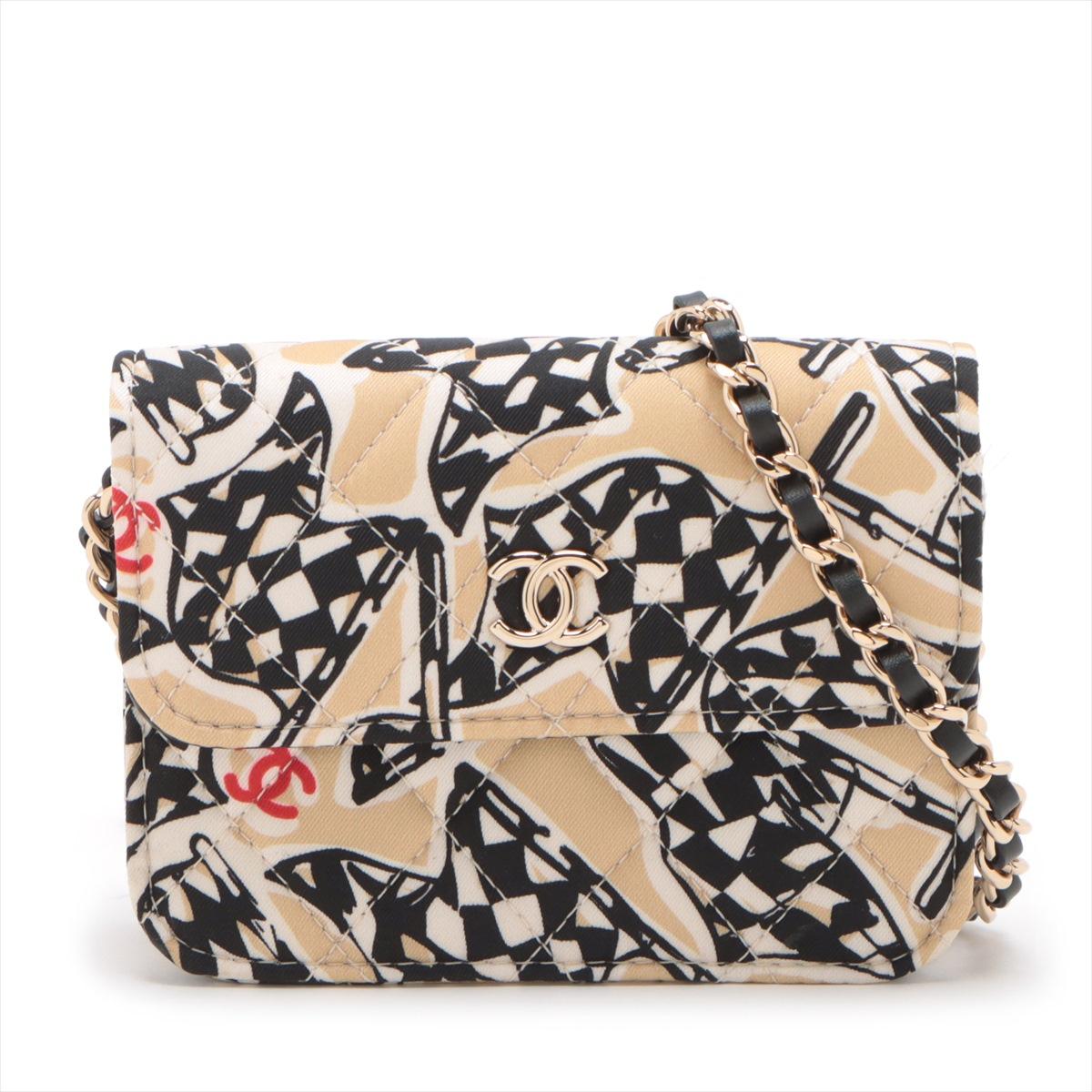 The Chanel Mini Matelasse Racer Flag Single Flap Single Chain Bag in Beige is crafted from soft material, offering a luxurious and tactile feel. Its exterior is adorned with a striking racer flag print, adding a dynamic and sporty touch to the