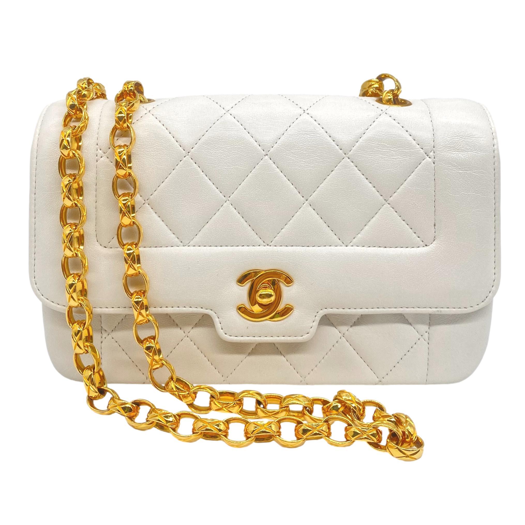 Chanel Mini Quilted White Lambskin Single Flap Bijoux Chain Shoulder Bag, 1989 - 1991. The iconic Chanel bag was originally issued by Coco Chanel in February 1955 which became the very first socially acceptable shoulder bag for the modern day woman