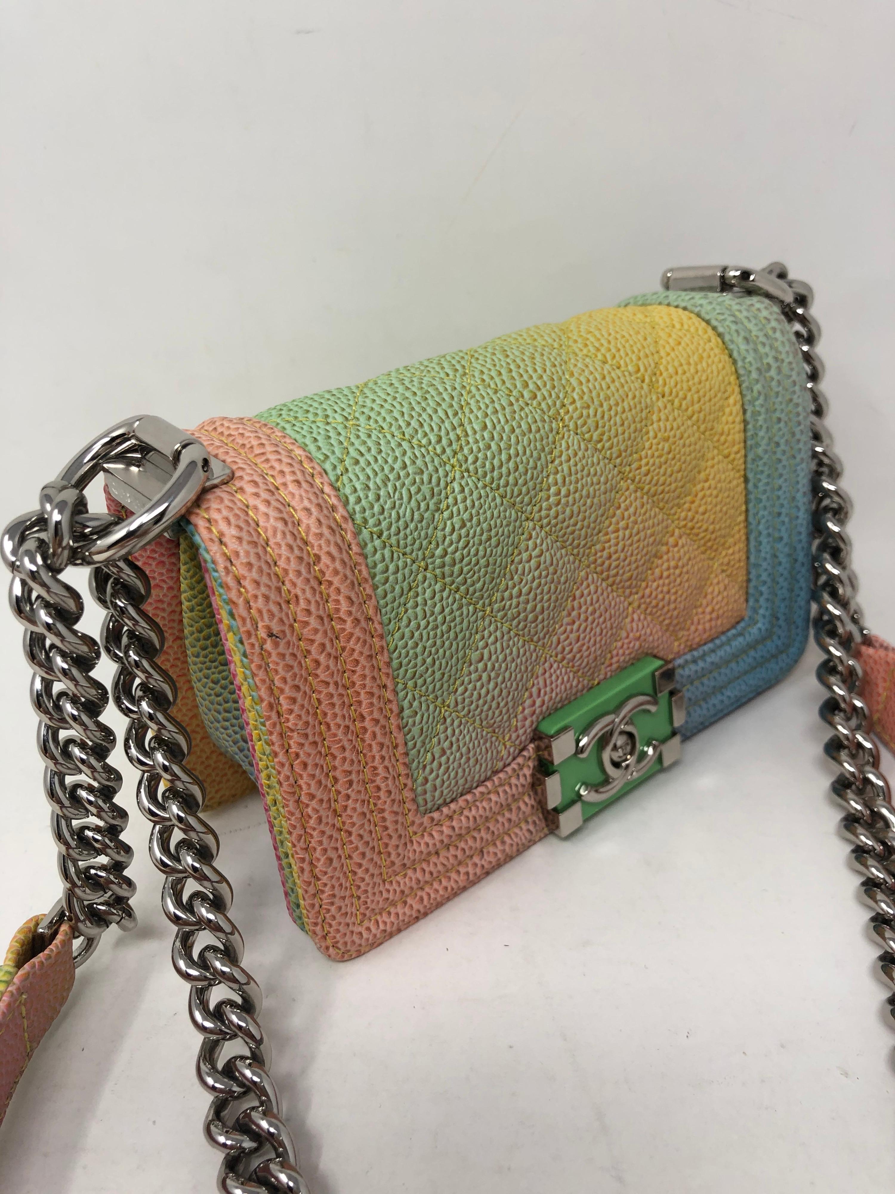 Chanel Mini Rainbow Pastel Boy Bag. Ruthenium hardware. Extra mini size crossbody bag. Can be doubled to worn shorter. Mint condition like new. Rare collector's piece. Don't miss out. Guaranteed authentic. 