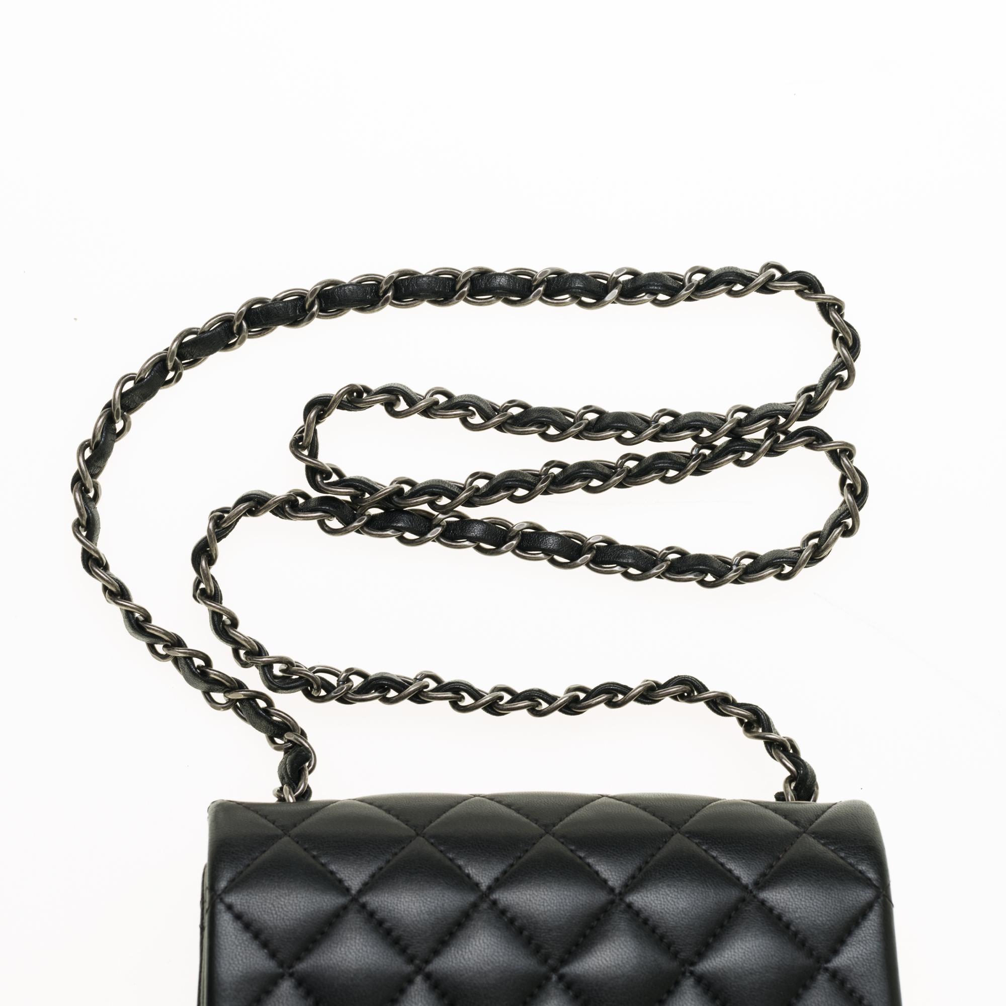 Women's Chanel Mini square handbag in black quilted leather, Silver hardware