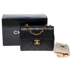 Chanel Mini Timeless flap shoulder bag in black quilted lambskin,  GHW