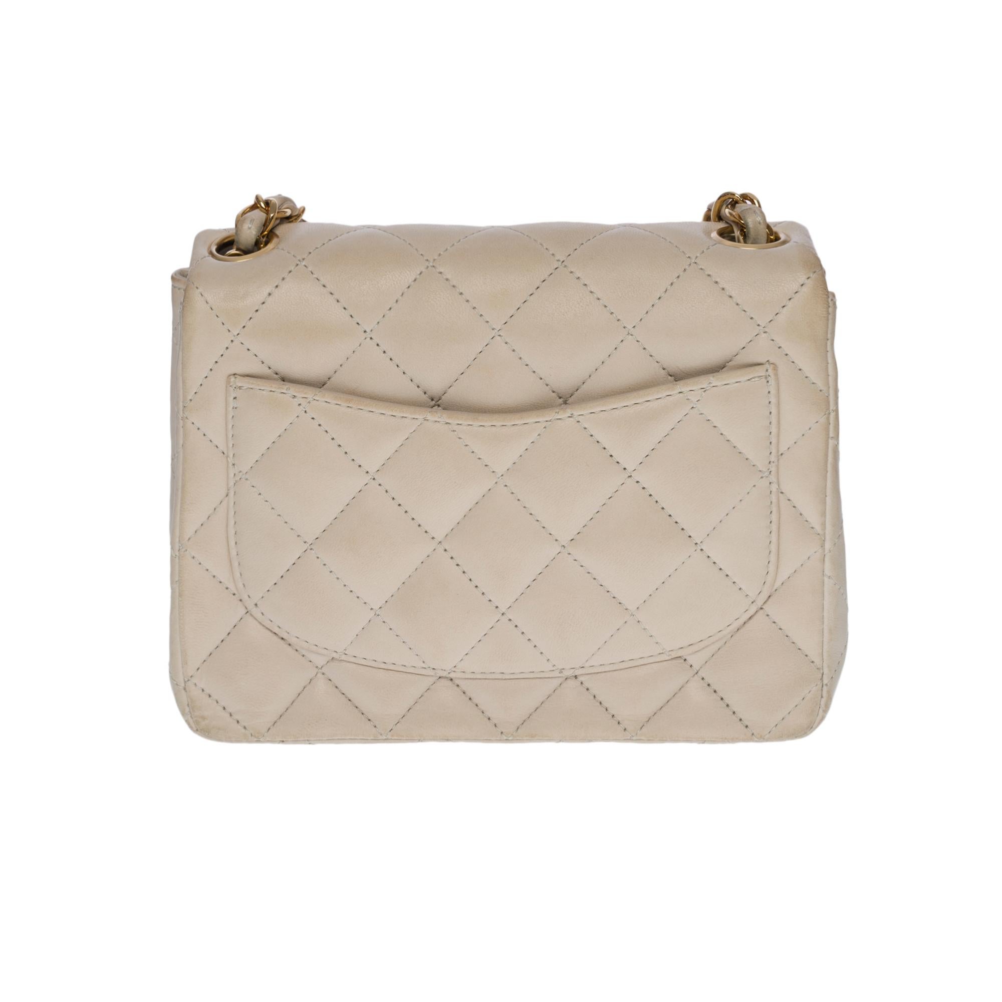 Gorgeous Chanel Mini Timeless Flap shoulder bag in ecru quilted lambskin leather, gold-plated metal hardware, gold-plated metal chain handle interlaced with ecru leather for a shoulder and shoulder carry
 
Backpack pocket 
Flap closure, gold-tone CC