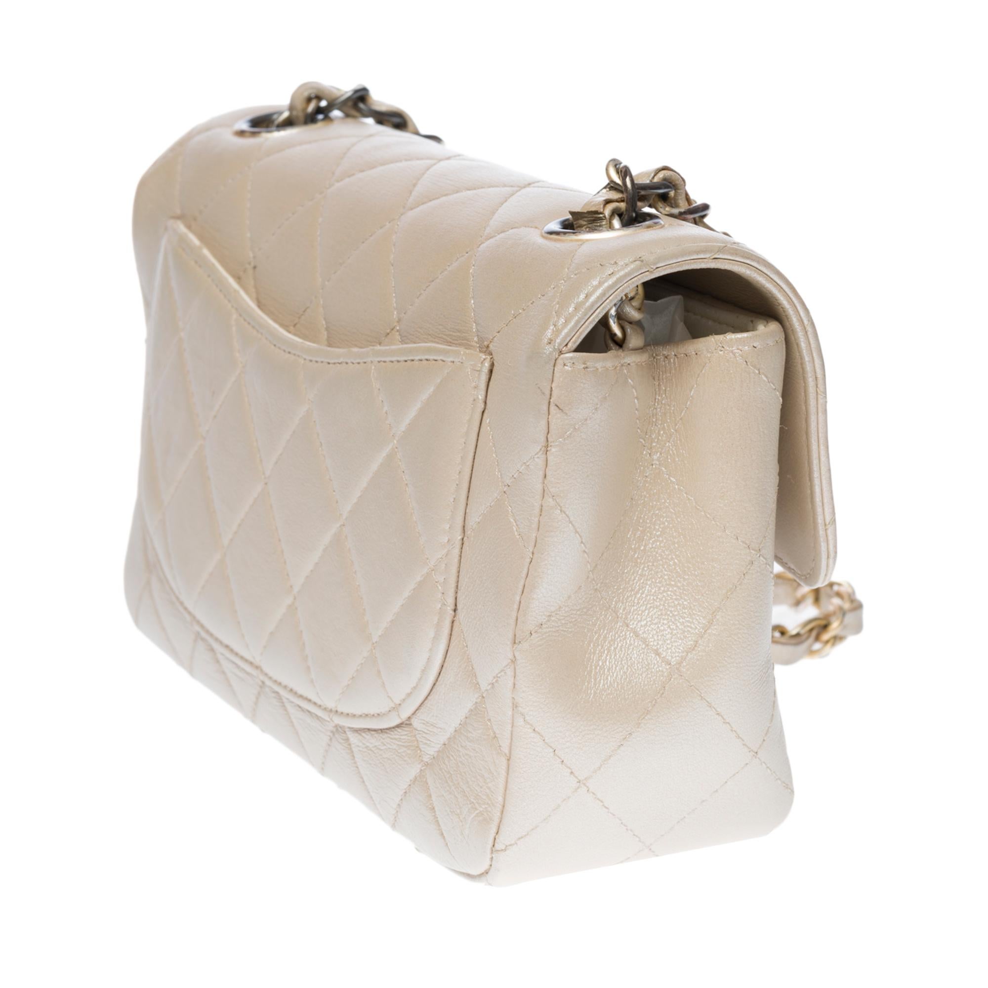 Chanel Mini Timeless flap shoulder bag in metallic mother-of-pearl leather, GHW In Fair Condition In Paris, IDF