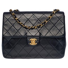Chanel Mini Timeless flap shoulder bag in navy blue quilted lambskin, GHW