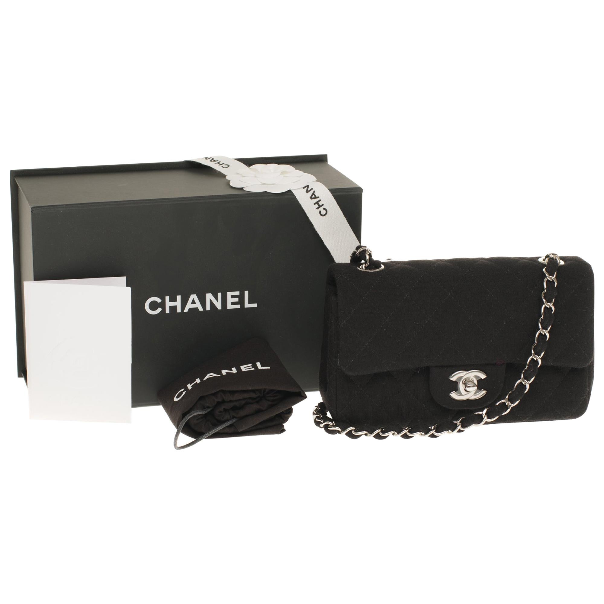 Chanel Mini Timeless handbag in black quilted Tweed and silver hardware