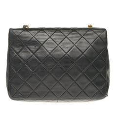 Chanel Mini Timeless in black quilted Lambskin shoulder bag with gold hardware