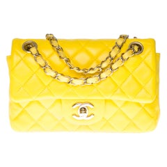 Chanel Mini Timeless Shoulder bag in Yellow quilted leather and silver hardware