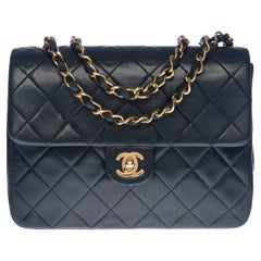 Chanel Mini Timeless shoulder flap bag in black quilted lambskin,  GHW