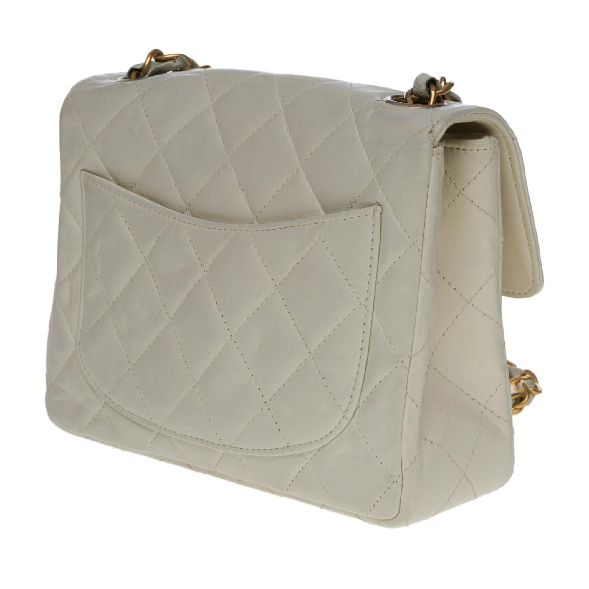 Black Chanel Mini Timeless shoulder flap bag in off-white quilted lambskin,  GHW