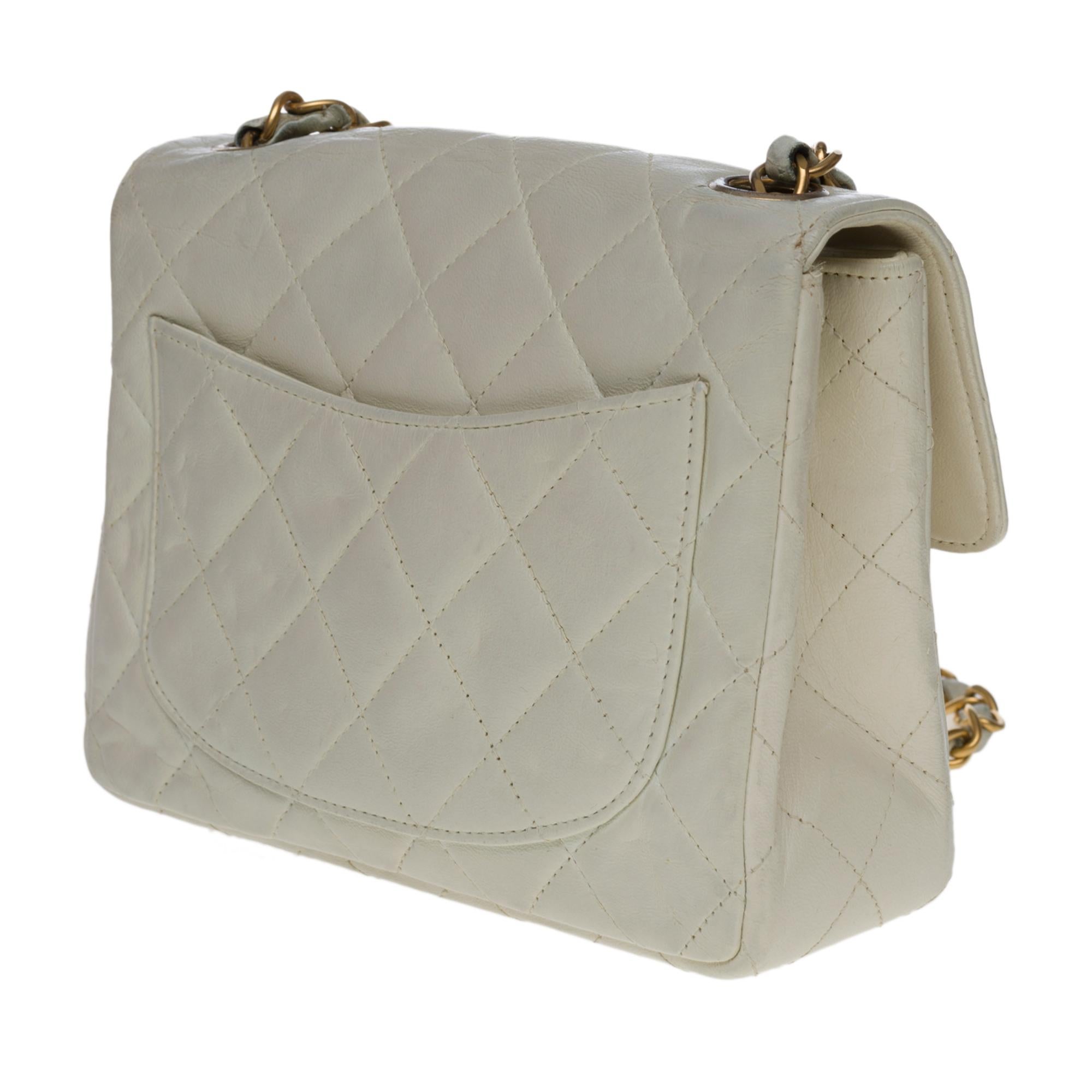 Chanel Mini Timeless Umhängetasche aus cremefarbenem gestepptem Lammfell,  GHW Damen
