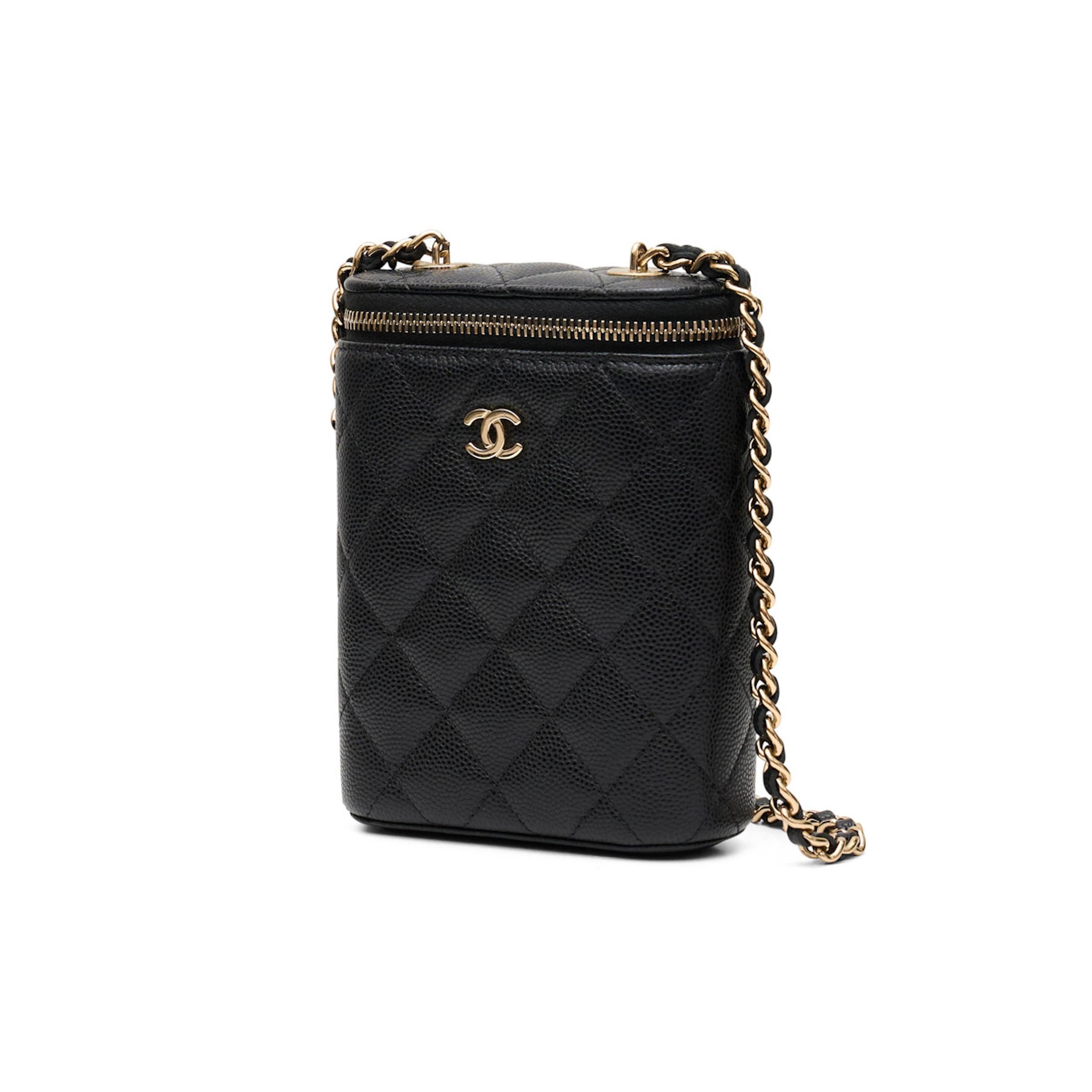 *Black
*Quilted caviar leather body
*Champagne gold-tone hardware
*Leather woven chain strap
*CC front logo
*Zip-around closure
*Interior mirror
*Burgundy leather interior 
*Serial Number: 32012297
*Condition: Very Good
*This vanity case is in very