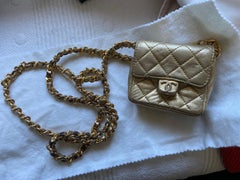 CHANEL Mini vintage gold bag