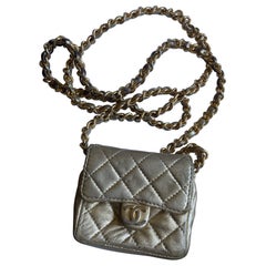 CHANEL Mini vintage gold bag