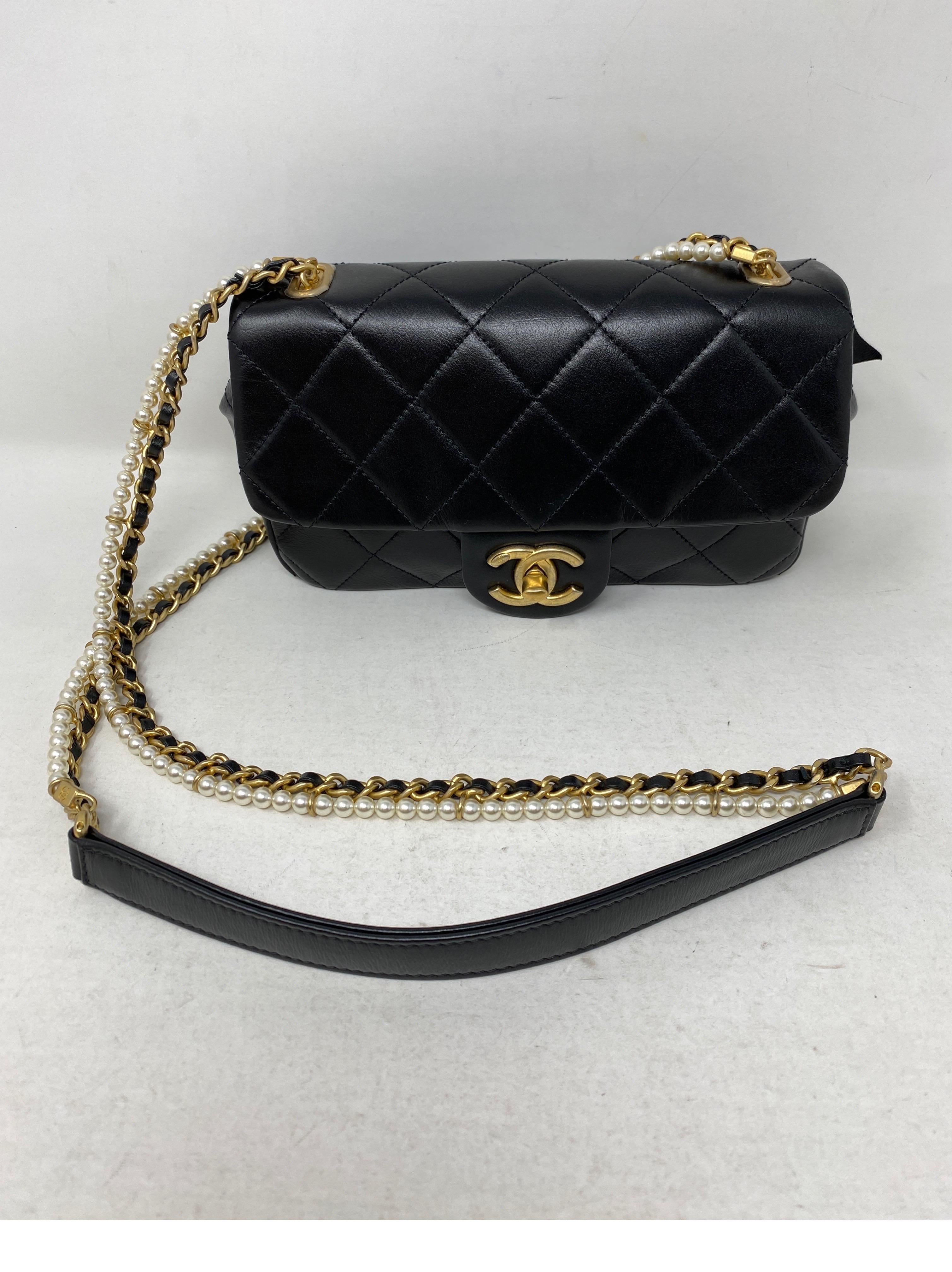 Chanel Black with Pearls Mini Bag. Crossbody bag. Gold hardware. New from 2020 collection. Never worn. Beautiful bag. Pricing for Chanel keeps increasing. Add this to your collection. Includes authenticity card, original receipt, tags, dust cover,