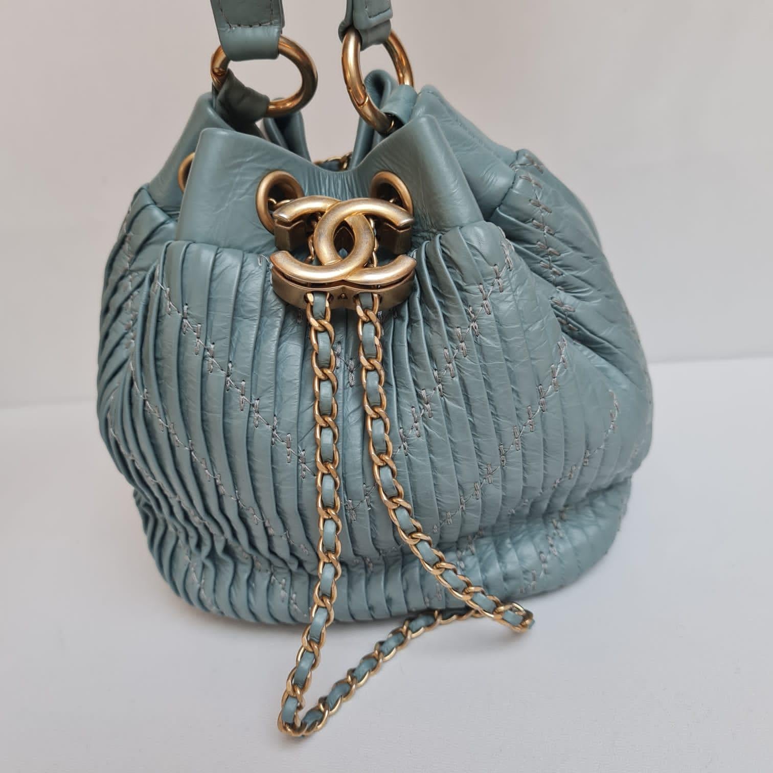 Beautiful Chanel mini pleated bucket bag in mint green color. Overall still in great condition overall, light scuffs on the hardware. From cruise 2018 collection. Missing its card. Comes only with holo sticker and dust bag.