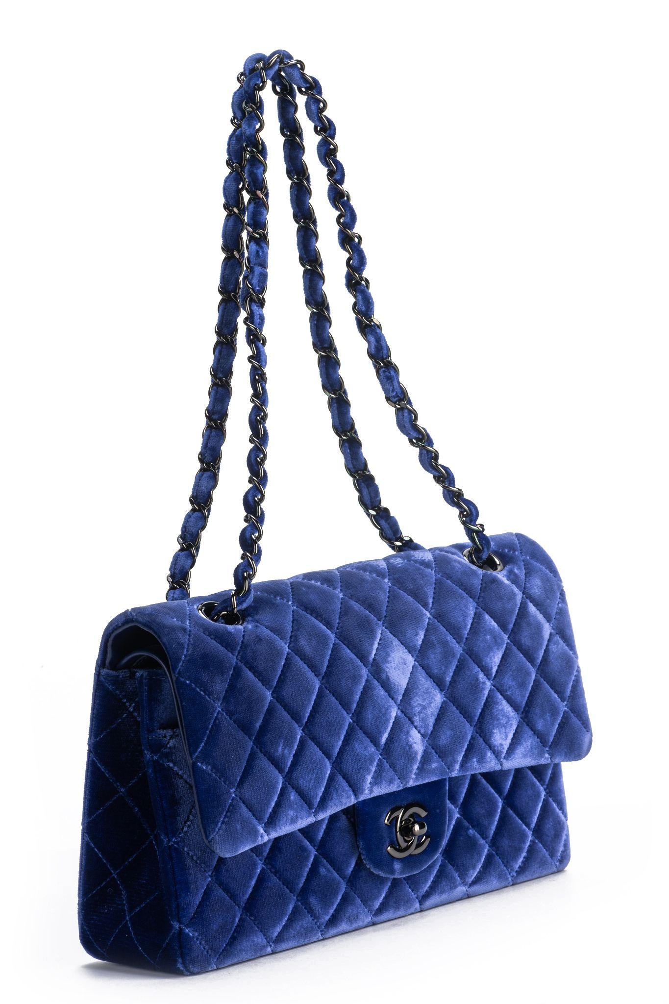 Chanel excellent condition blue velvet double flap, blue leather lining and black hardware.  Shoulder drop 9”/19”. 
Comes with hologram, ID card and original dust cover.
Collection 20. Current store price $10,200.