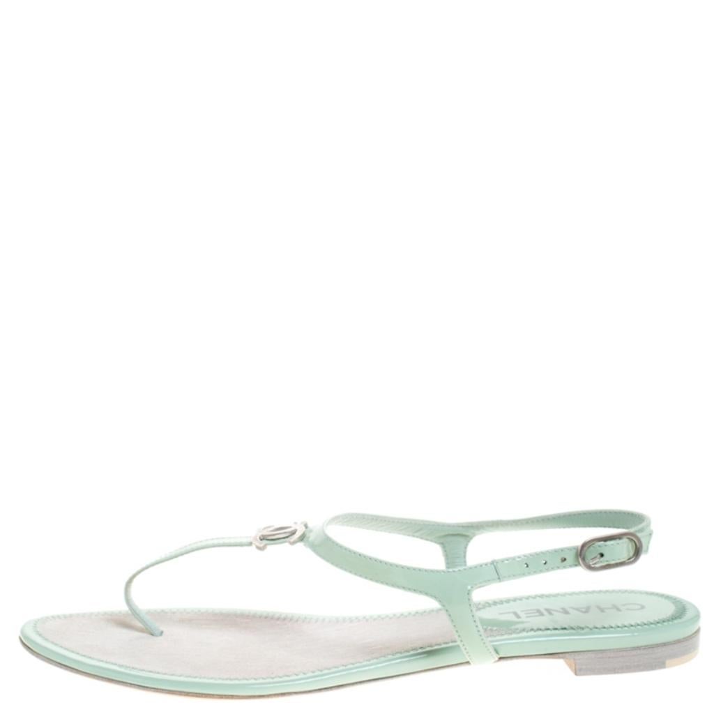 Comfort coupled with fashion creates wonders and these sandals from Chanel are a true example of that. These mint green sandals are crafted from patent leather into a thong design. They flaunt the signature CC logo on the uppers.

Includes: Original