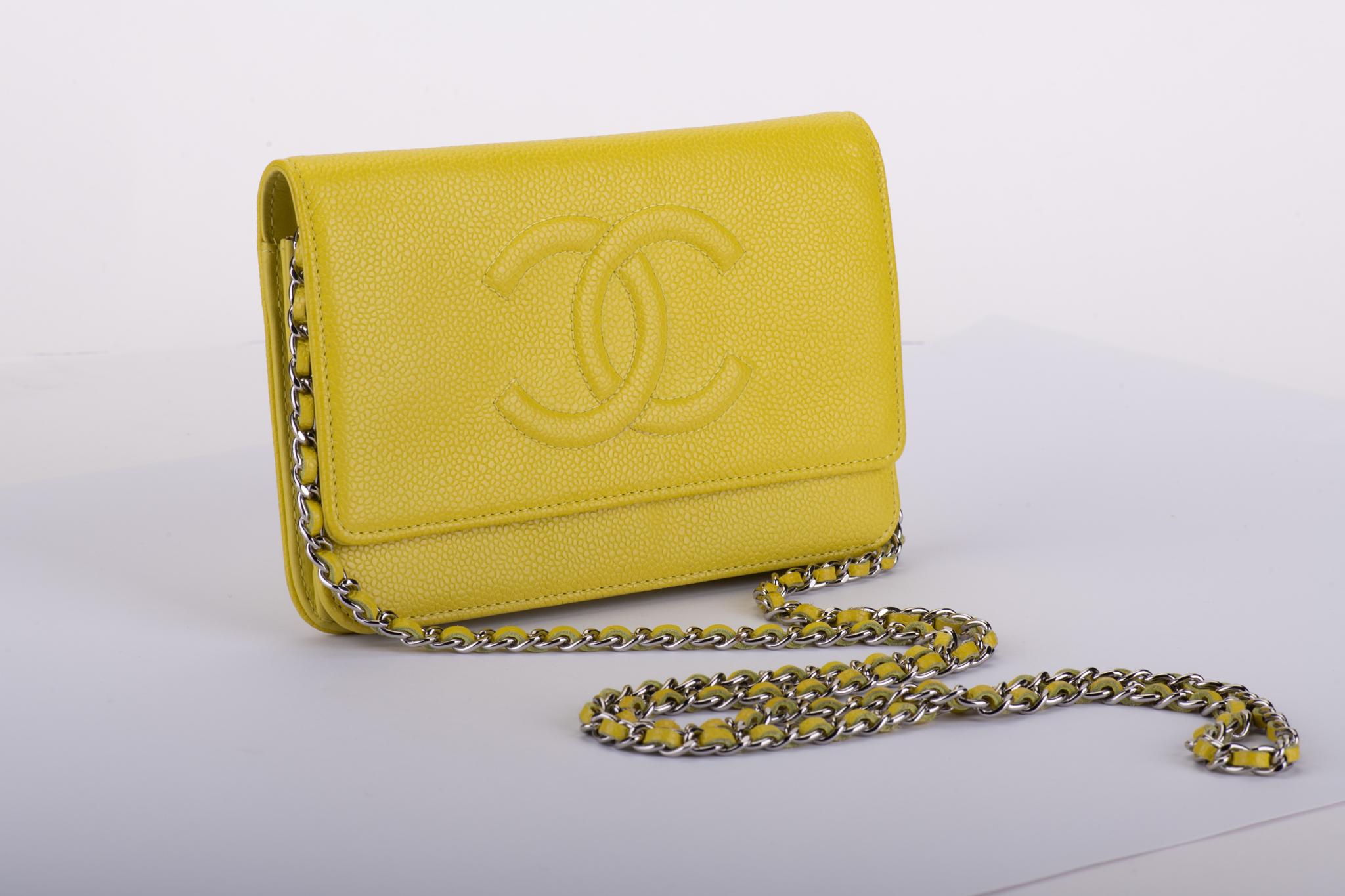 Chanel lemon yellow caviar  wallet on a chain cross body. Excellent condition. Comes with hologram, dust cover and box.