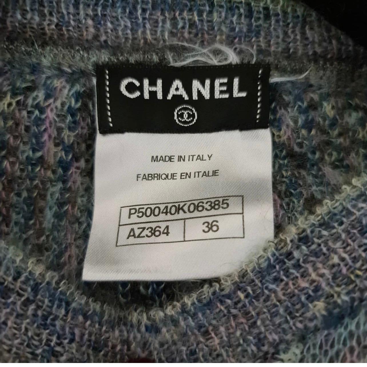 From the Pre-Fall 2014.

Lavender and multicolor Chanel mohair-blend sweater with sequin embellishments at center front, rib knit trim and crew neck

Condition is excellent.

Sz.36

For buyers from EU we can provide shipping from Poland. Please