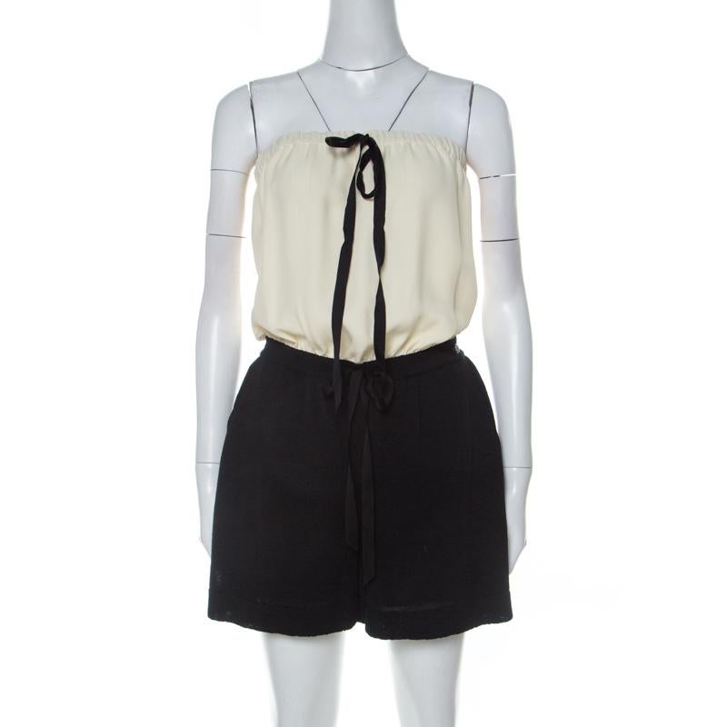 This strapless Chanel romper will become your most-liked choice whenever you step out. It comes made from linen and silk in a design of separates. The monochrome romper can be teamed with slides, heels or sneakers.

