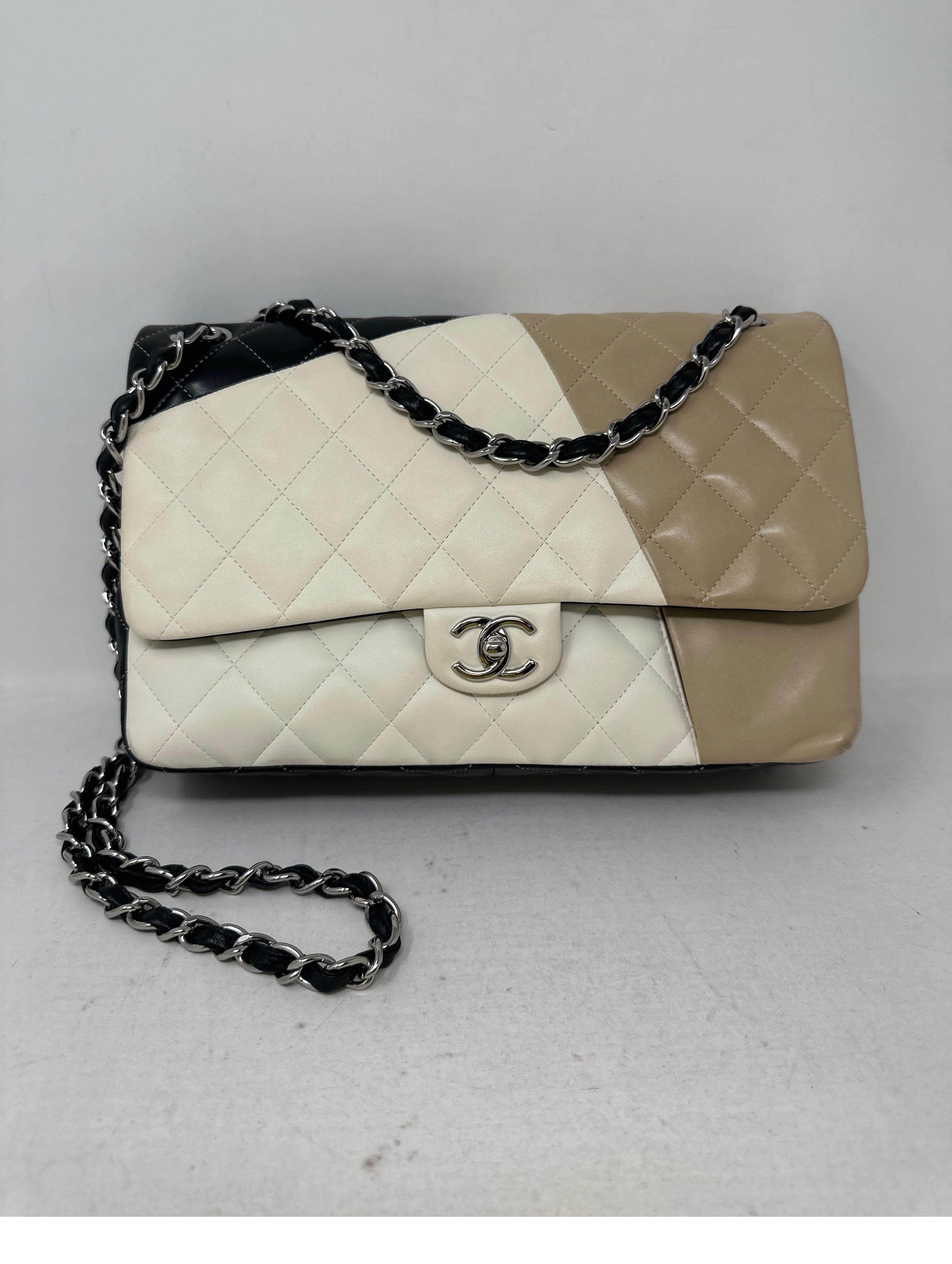 Chanel Multi-Color Jumbo Bag. Cream, black, tan with black leather chain strap. Most wanted size jumbo. Can be worn crossbody or doubled as a shoulder bag. Interior clean. Nice condition. Guaranteed authentic. 