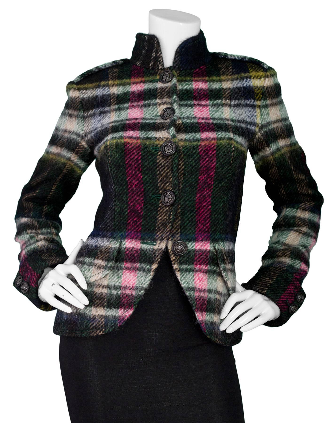 Chanel Multi-Color Plaid Wool-Blend Jacket Sz FR36

Features lion-head buttons

Made In: France
Color: Black, multi-color
Year Of Production: 2013
Composition: 64% Wool, 12% Alpaca, 12% nylon, 12% mohair
Lining: Black, 100% silk
Closure/Opening: