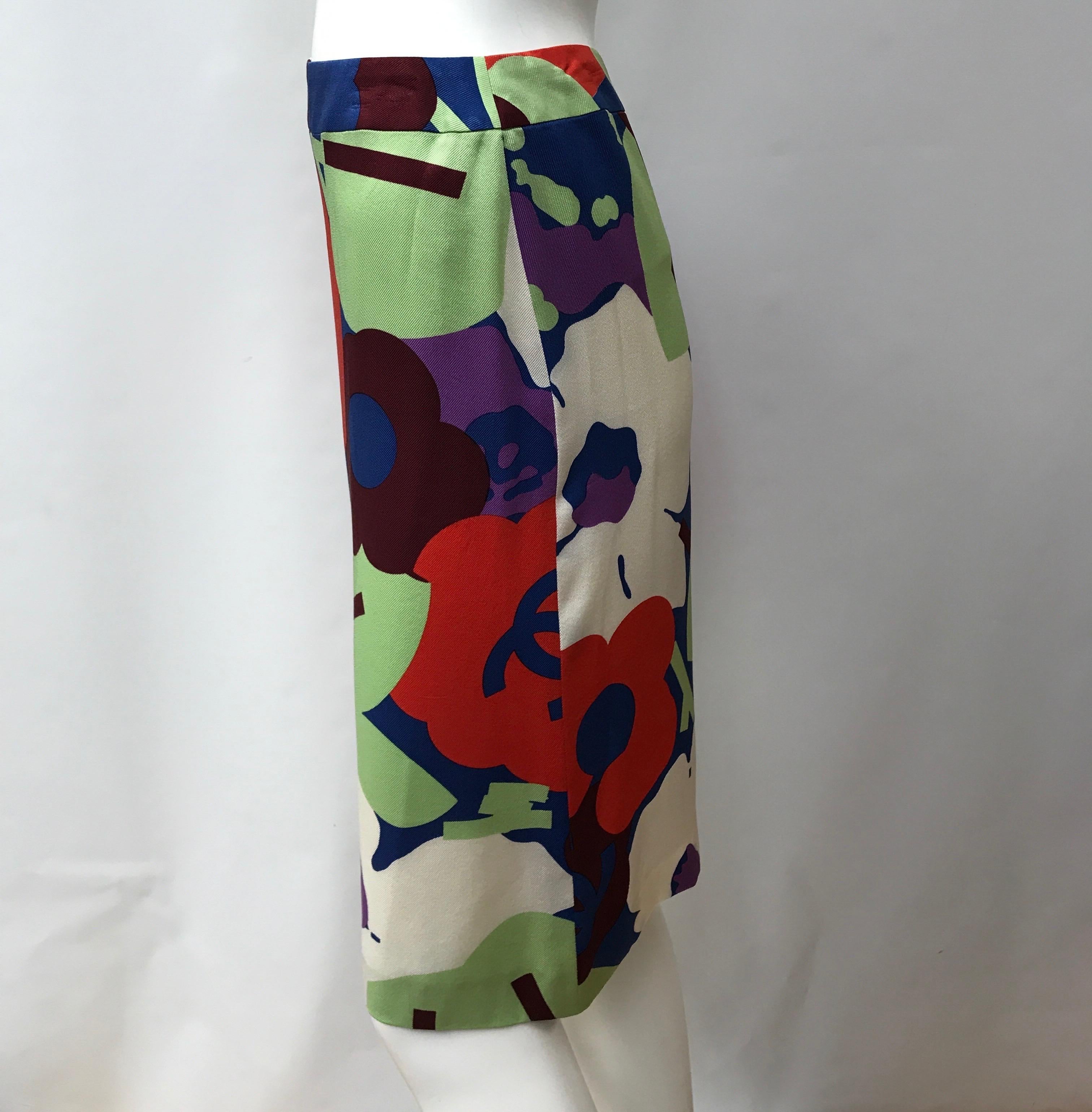 Chanel Multi colored Silk Skirt-38 from the runway of the 2000 Spring/Summer collection. This adorable Chanel skirt is in excellent condition, it has minimal sign of use. It is made entirely of silk and has a floral pattern with multi colors. There