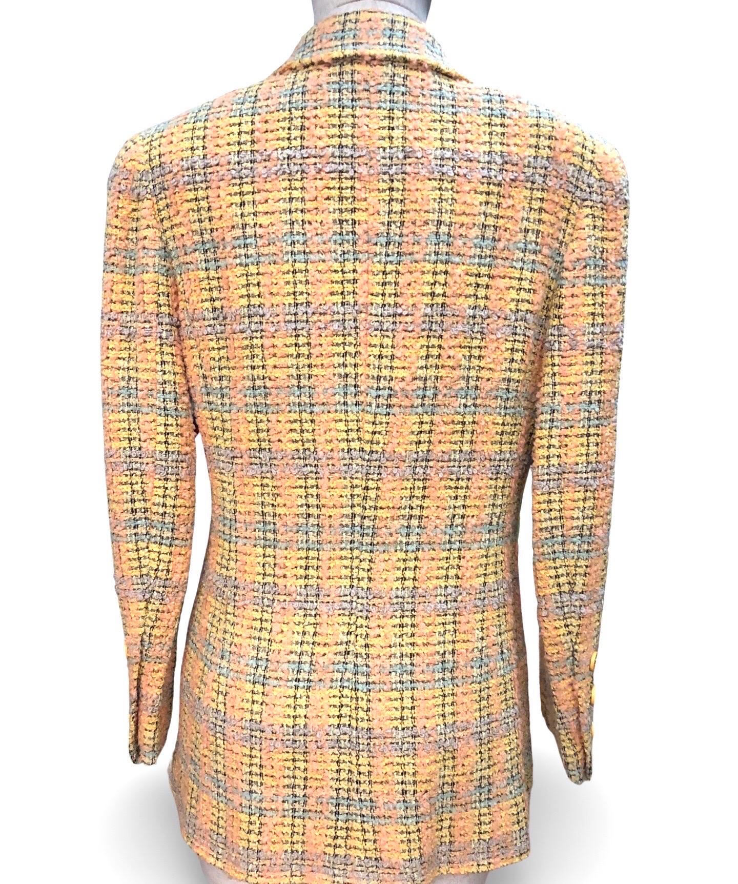 - Chanel multi-coloured yellow/orange tweed jacket from year 1994 A/W collection. 

- Featuring a yellow gold toned CC button single breasted closure.

- Front chest open pocket and two front open pockets.

- Size 40. (it fits like 38.) 

- 72%