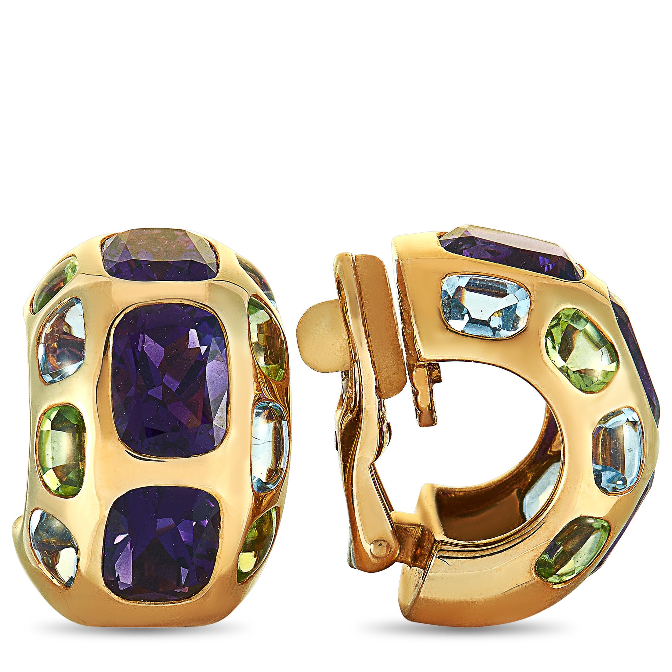 These Chanel earrings are crafted from 18K yellow gold and embellished with multiple gemstones. The earrings measure 0.75” in length and 0.50” in width, and each of the two weighs 11.5 grams.

Offered in estate condition, this pair of earrings
