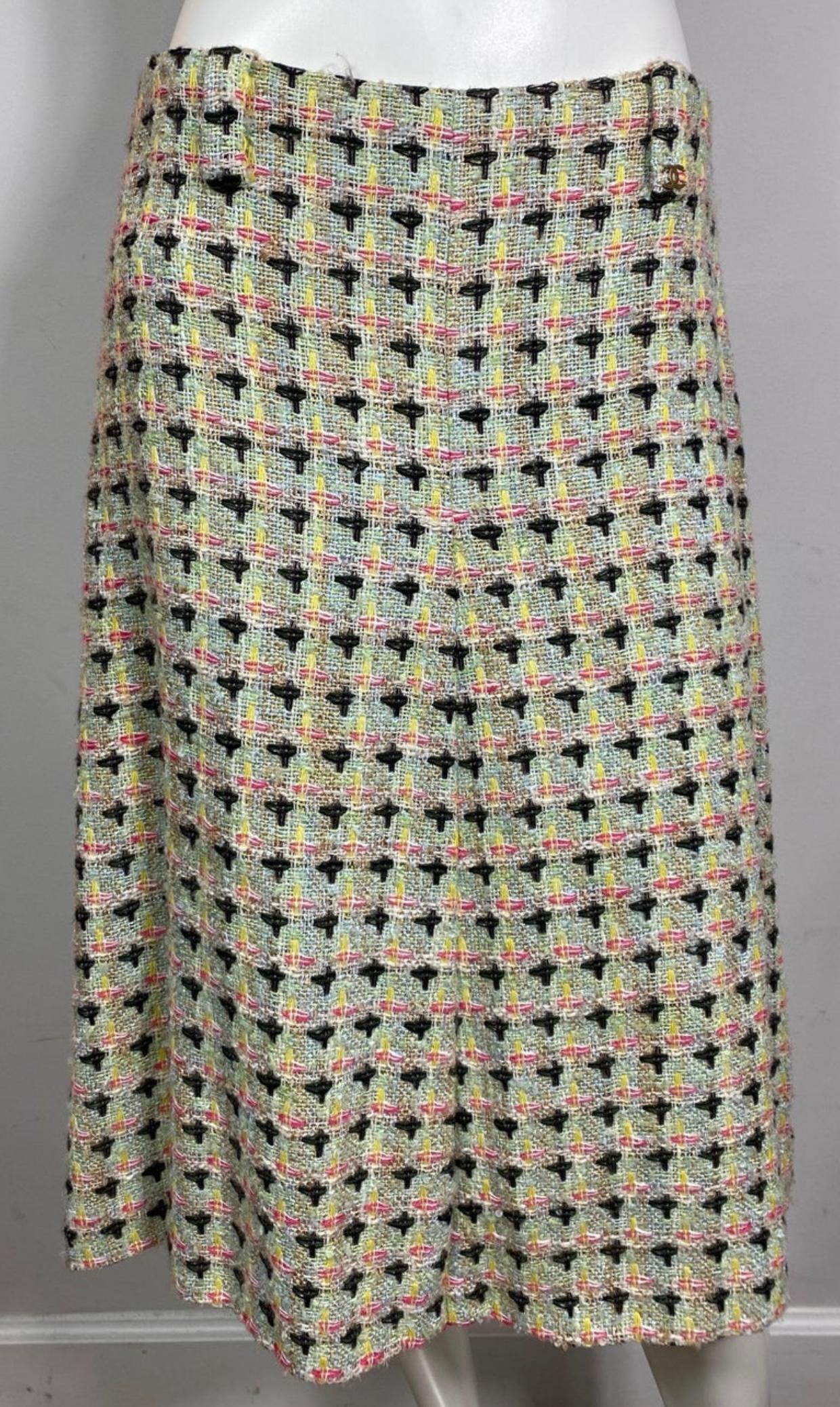 Chanel Multi Pastel Patterned Lightweight Tweed Skirt - 40 - Spring 2002 This classic chanel piece was featured as look 26 on the Runway at the Chanel Spring 2002 fashion show. This skirt has wonderful colors for spring. It is an a-line cut, is