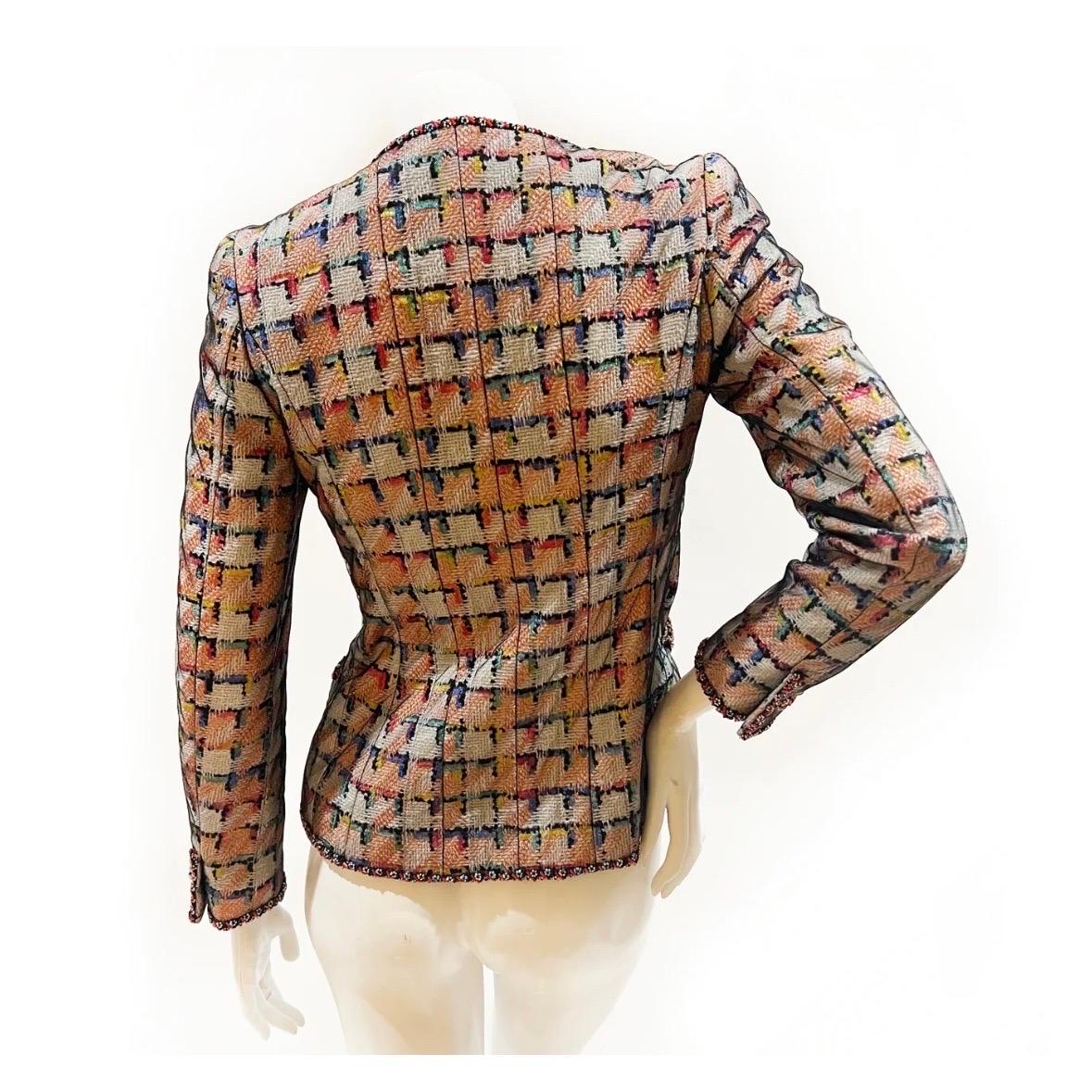 Multicolor Beaded trim jacket by Chanel
Cruise 1998 collection
Made in France
Multicolor houndstooth throughout
Top layer of black transparent mesh 
Colorful beaded flower trim 
Double chain-button front closure 
Double breast and waist