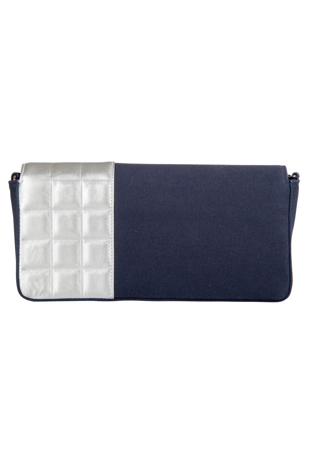 This signature No.5 flap bag showcases everything we know and love about Chanel. The blue canvas exterior is decorated with a white quilted leather panel with a large ‘5’ that pays tribute to the popular Chanel No.5 perfume. It also features the