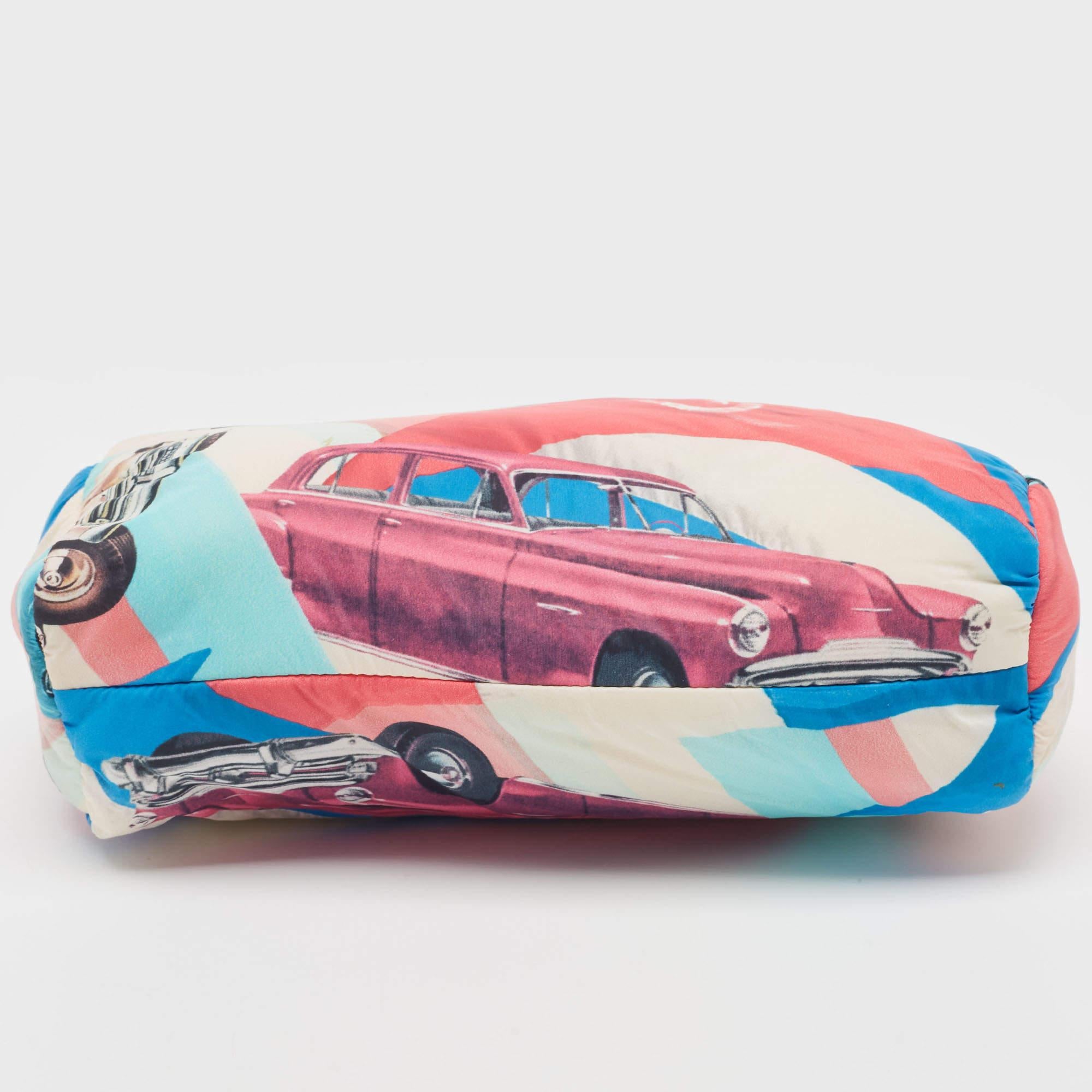 Keep your essentials effortlessly in this Chanel car print pouch. It features an elegant design and a roomy interior. This accessory will come in handy while traveling.

Includes: Authenticity Card, Brand Dustbag

