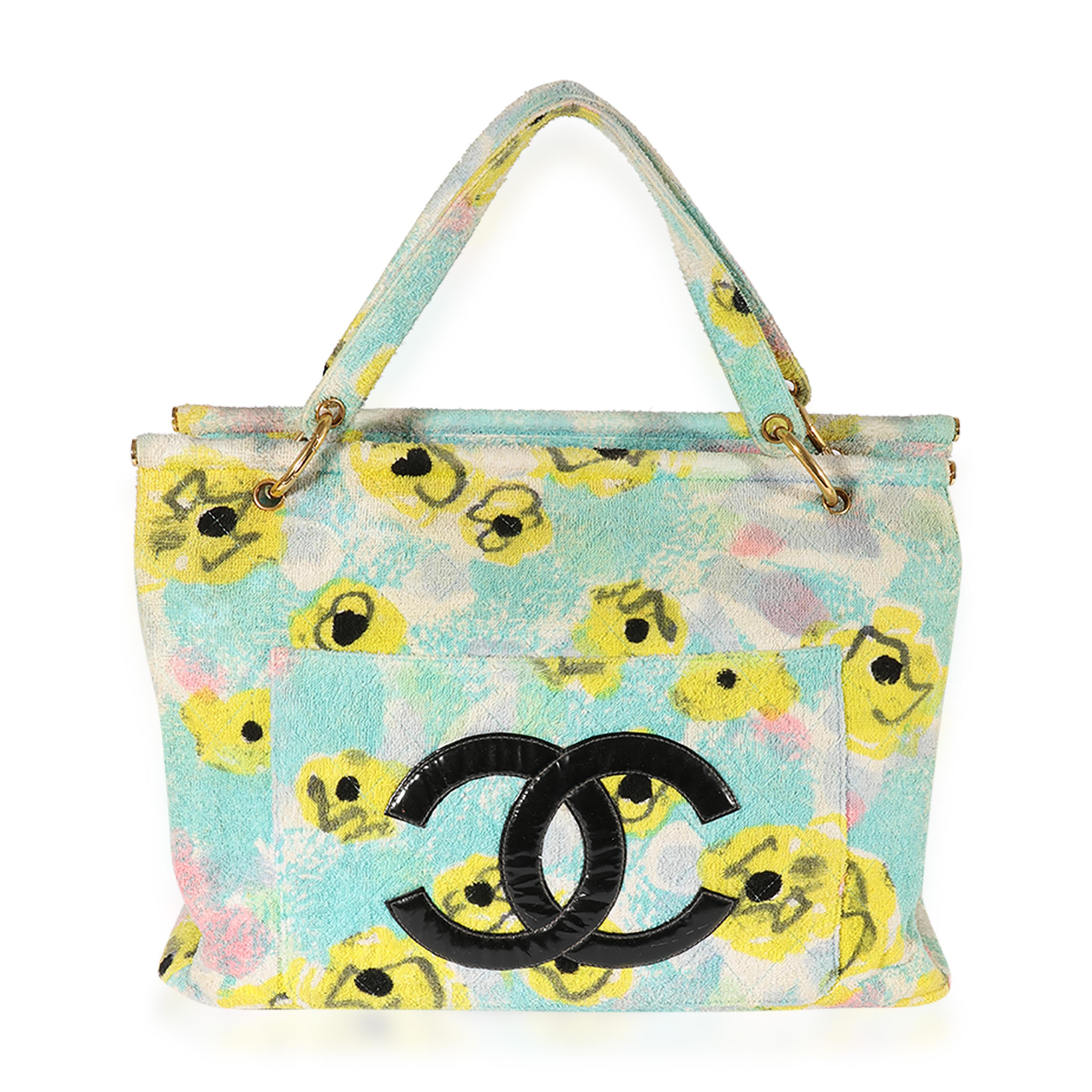 Listing Title: Chanel Multicolor Floral Print Terrycloth Frame Tote
SKU: 122800
Condition: Pre-owned 
Handbag Condition: Very Good
Condition Comments: Very Good Condition. Scuffing and discoloration at corners. Scratching at hardware. Interior