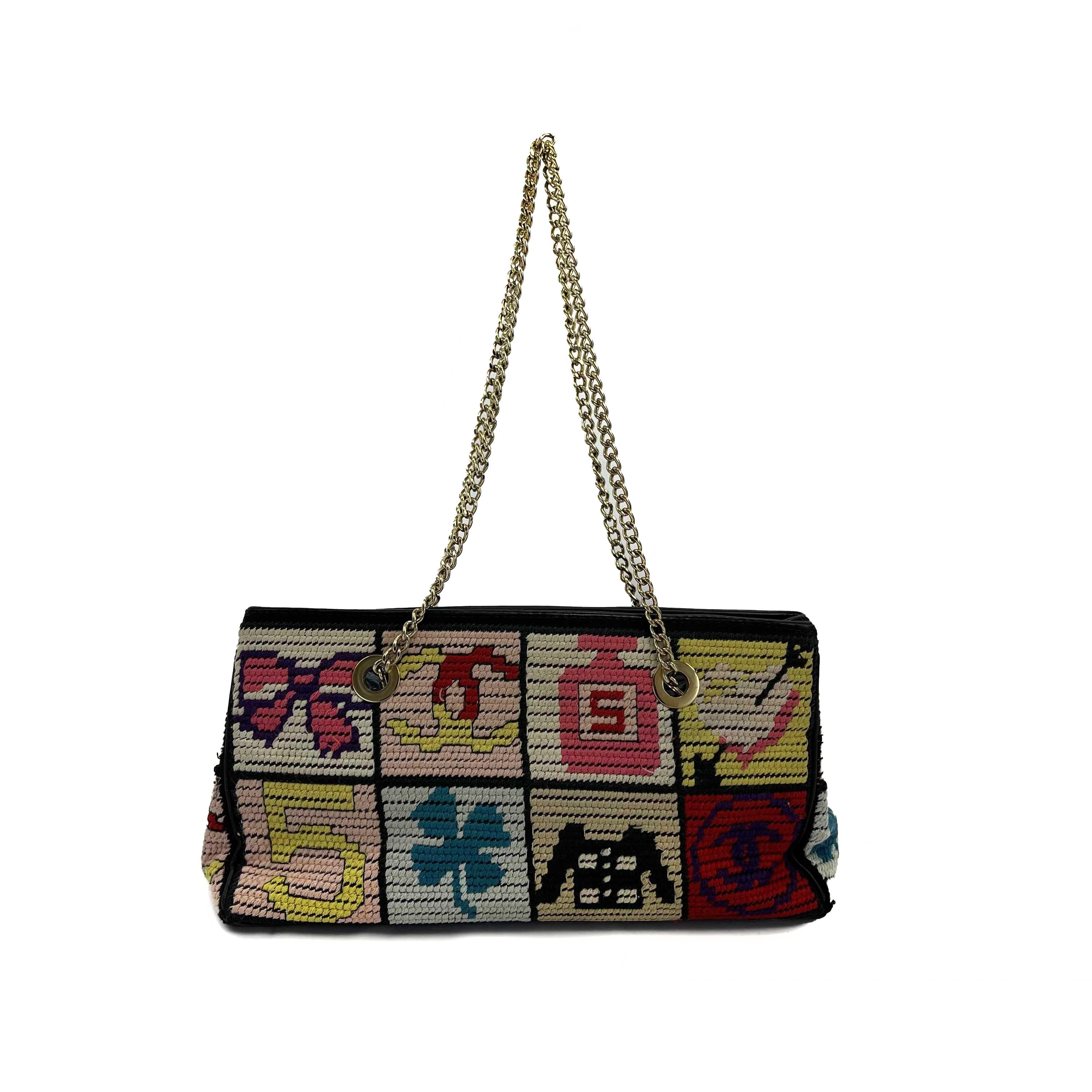 Chanel - Good - Multicolor Knit Needlepoint Patchwork Shoulder Bag - Black, Multicolor - Handbag

Description

Crafted in multicolour Crochet tweed with classic Chanel icons, this chic bag features dual-chain straps, protective base studs and