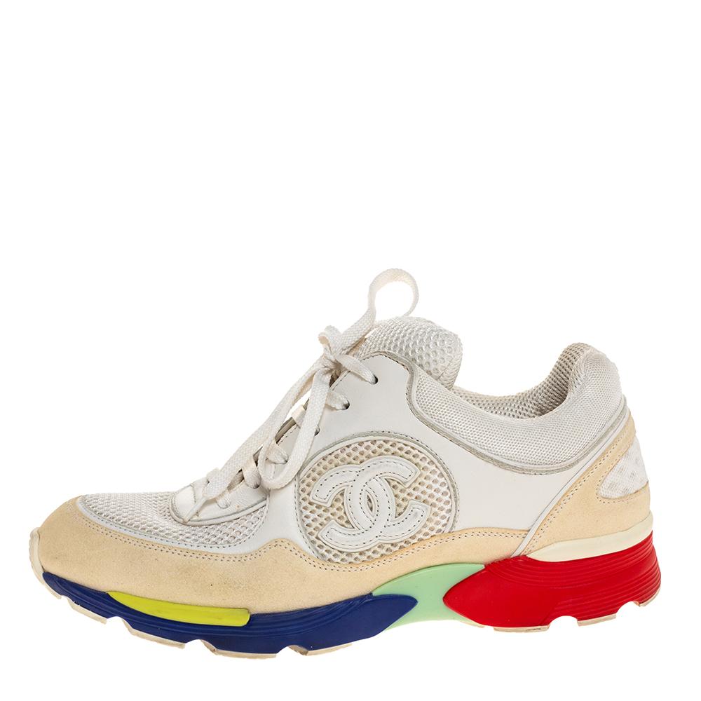 Look your stylish best every time you step out wearing these low-top Chanel sneakers. Crafted from quality fabric, suede, and leather, these sneakers feature lace-ups and the iconic CC logo on the sides. They are finished with mesh lining, leather