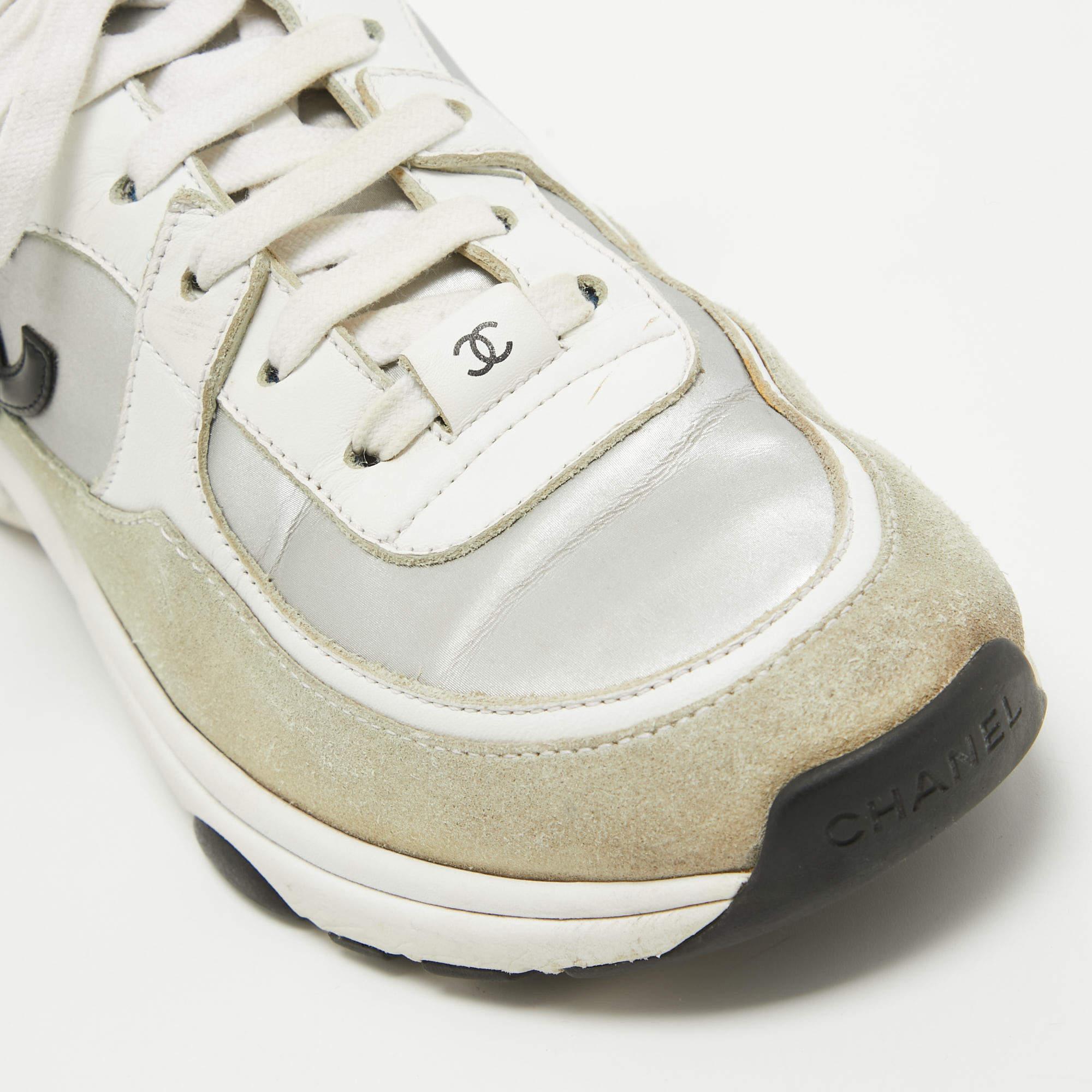 Coming in a classic silhouette, these Chanel women's sneakers are a seamless combination of luxury, comfort, and style. These sneakers are designed with signature details and comfortable insoles.

