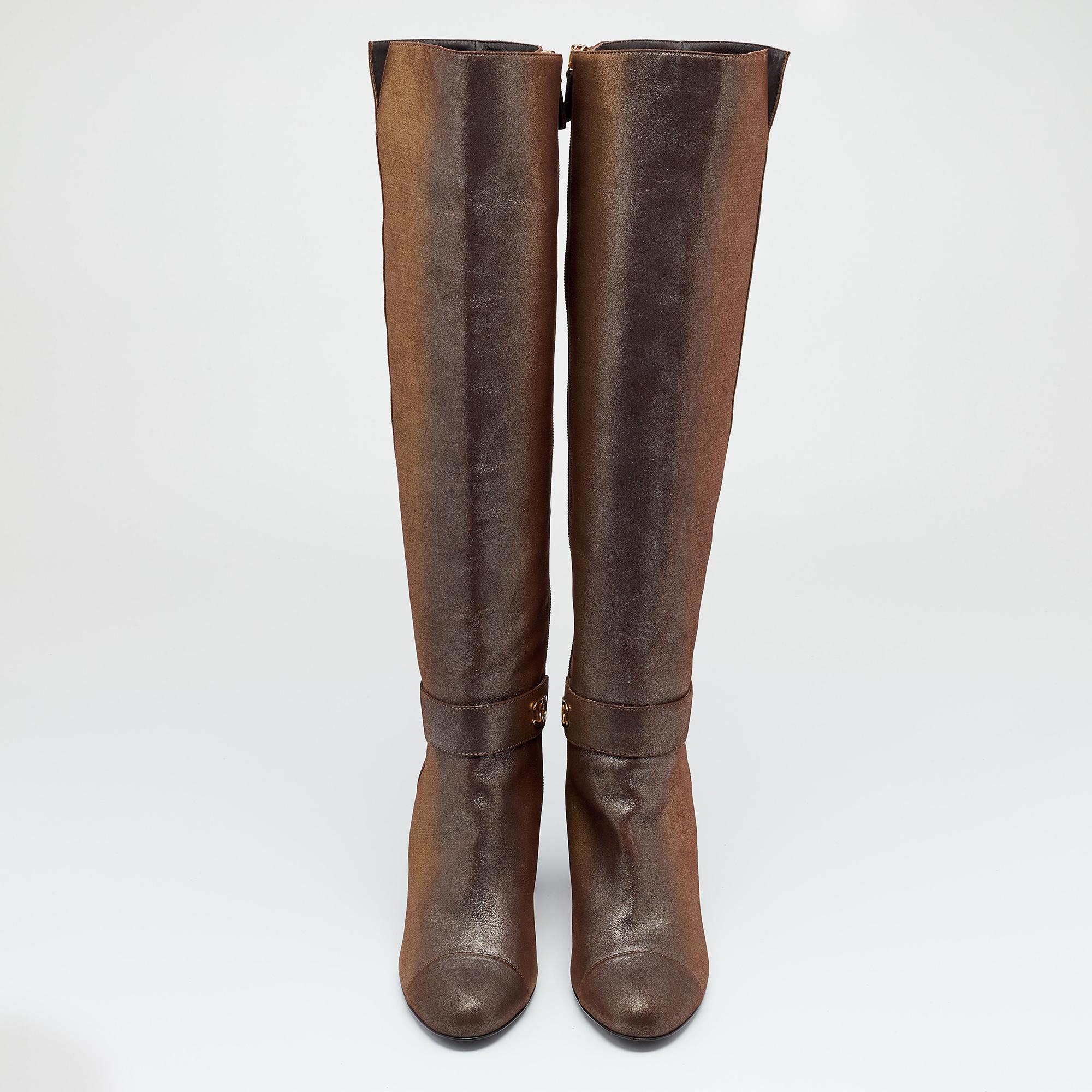 Add an edgy touch to your look with these knee-length boots from Chanel. Crafted in multicolored leather, the pair has closed toes, zippers, and gold-tone hardware. Sturdy soles and comfortable insoles contribute to making these boots ideal for