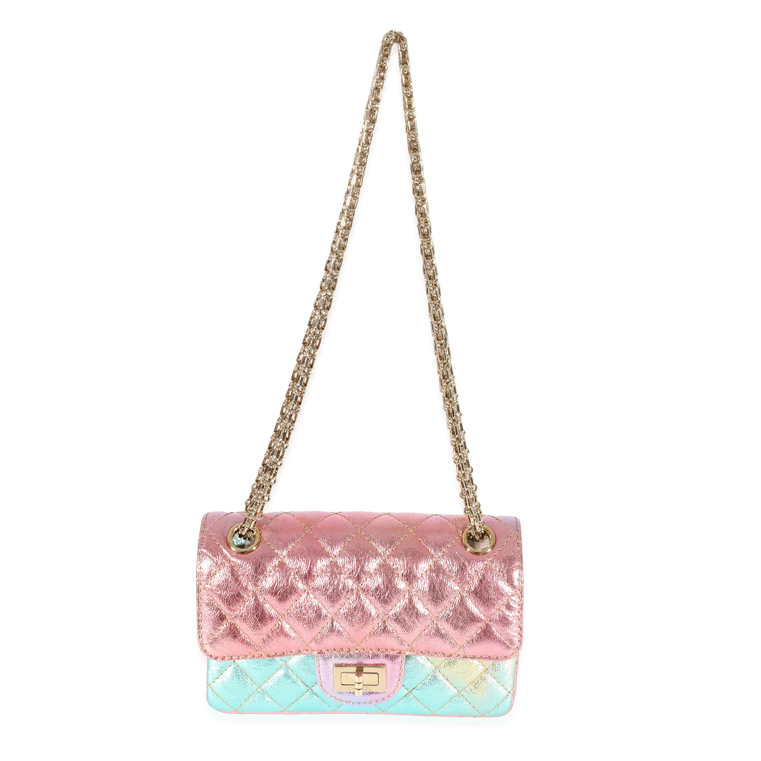 Listing Title: Chanel Multicolor Metallic Goatskin Mini Reissue 2.55
SKU: 129596
MSRP: 6500.00
Condition: Pre-owned 
Handbag Condition: Excellent
Condition Comments: excellent Condition. Plastic at some hardware. Exterior light corner scuffing.