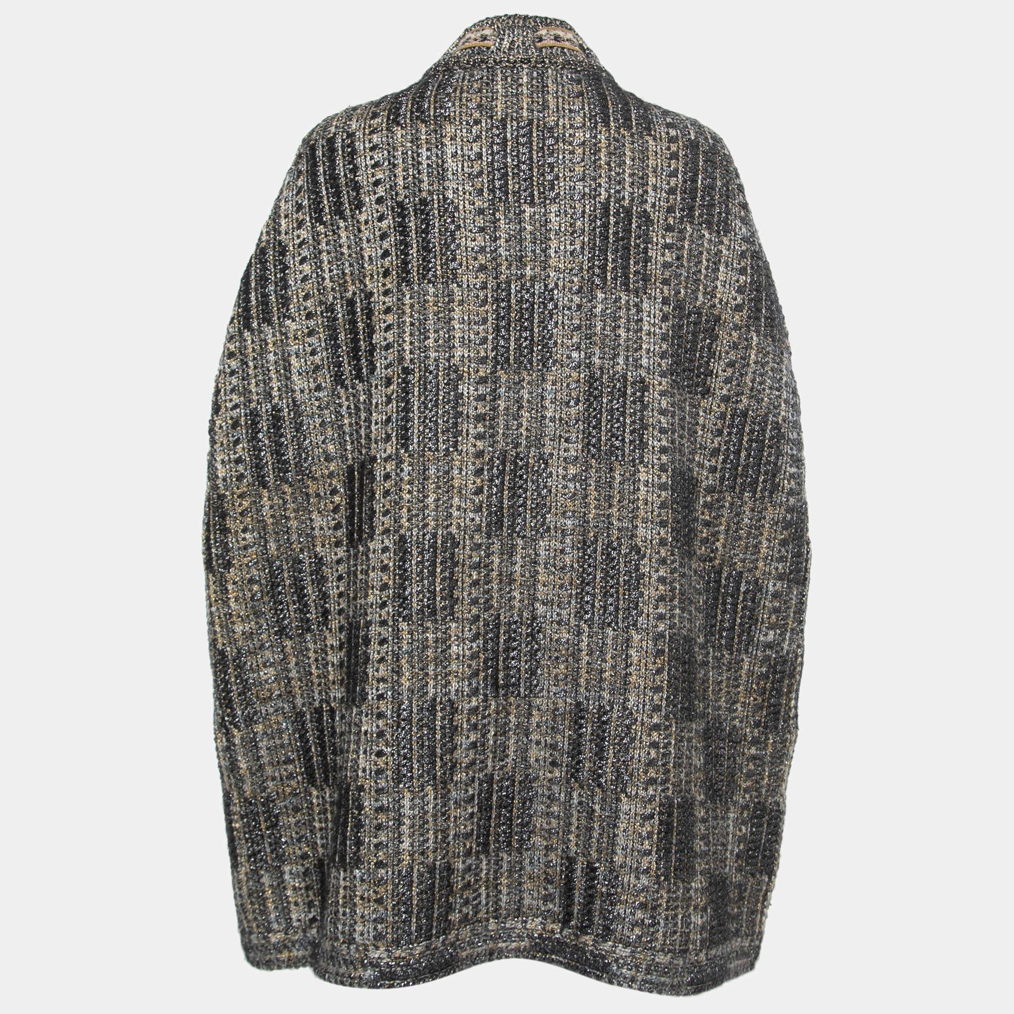 Your closet is never complete without a stunning poncho like this. This cardigan from Chanel is efficiently tailored using high-quality fabric in pleasant shades, which adds a luxurious edge to your outfit.

