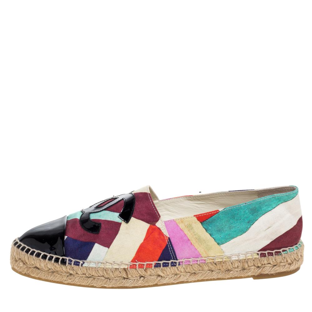 Over the years, Chanel's range of espadrilles has been chosen by fashionistas for their casual style. The craze still lives on. From their Cuba Cruise Collection comes this crepe pair that has Cuba prints, patent leather cap toes, the CC logo on the