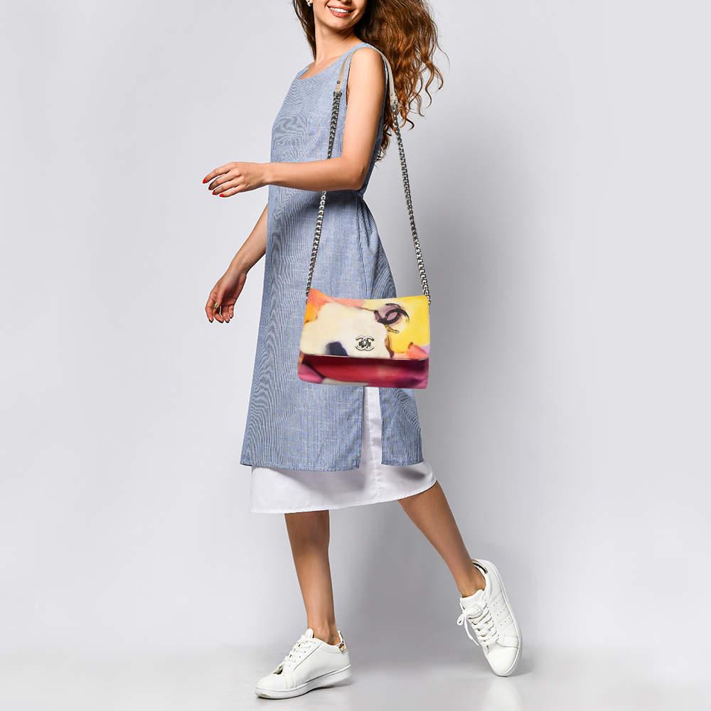 Brimming with elegance and beauty this Chanel Flower Power messenger bag will add a colorful accent to your ensemble. Made using the best materials this exquisite creation is a perfect ode to the Houses meticulous craftsmanship.