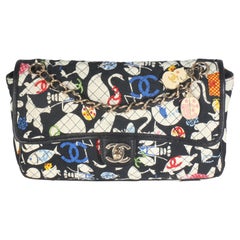 Chanel Bolso con solapa de lona acolchada multicolor con estampado animal