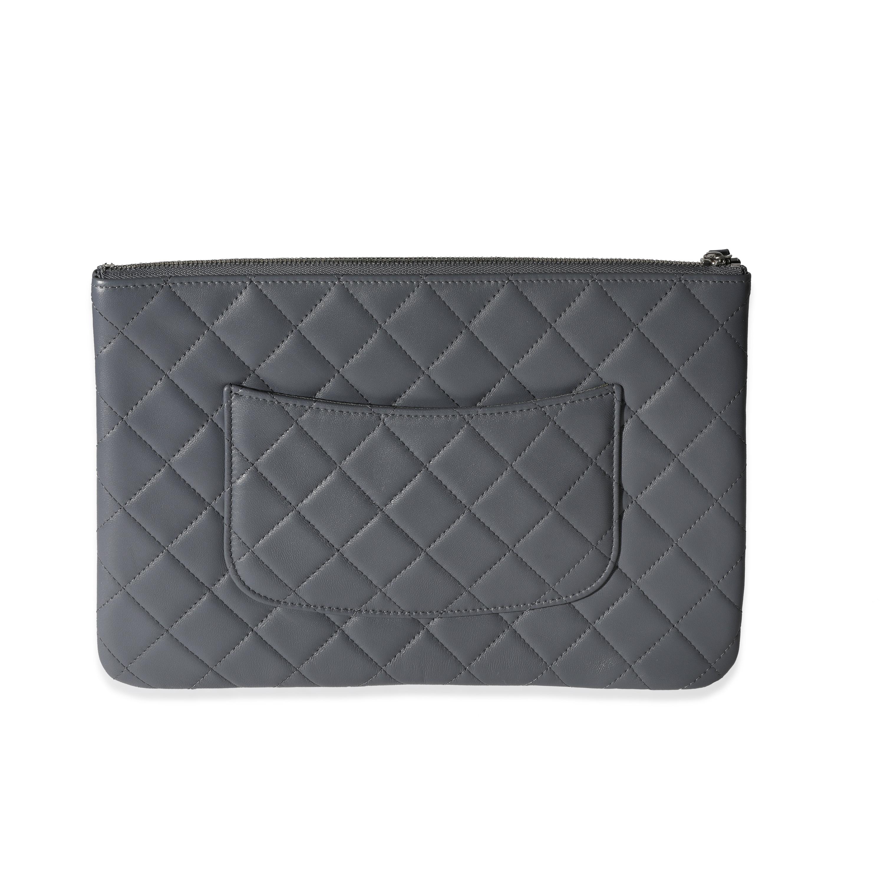 Listing Title: Chanel Multicolor Quilted Lambskin Multi-Pocket Zip Case
SKU: 117762
Condition: Pre-owned (3000)
Handbag Condition: Never Worn
Brand: Chanel
Model: Grey Multicolor Quilted Lambskin Multi Zip Pouch
Origin Country: Italy
Handbag
