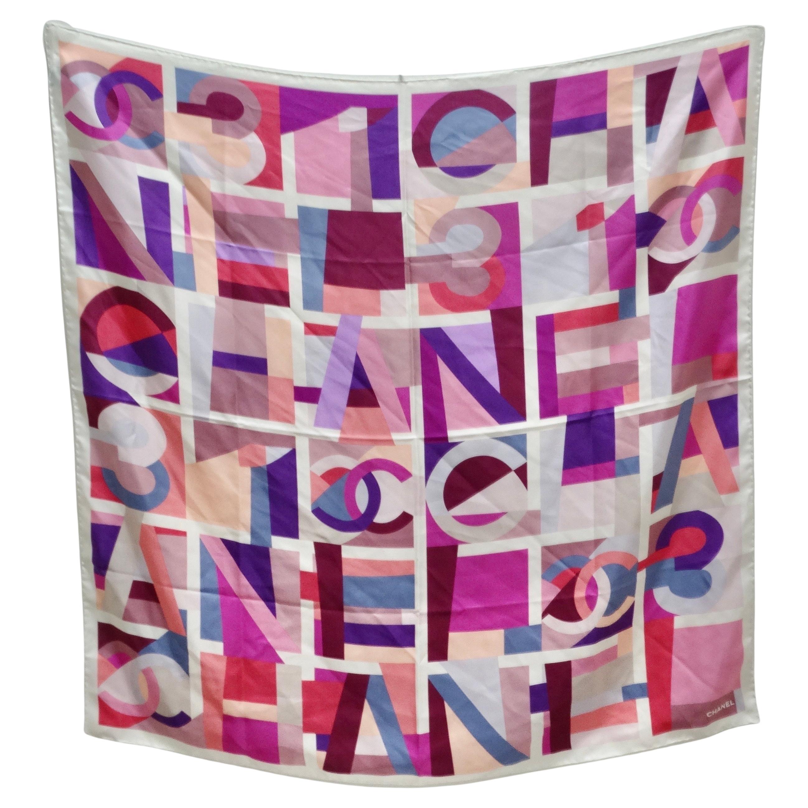 Elevate your style with the Chanel Multicolor Silk Logo Scarf – a stunning and versatile accessory that effortlessly combines luxury and fashion-forward design. This silk scarf boasts a beautiful multicolor print that catches the eye with its