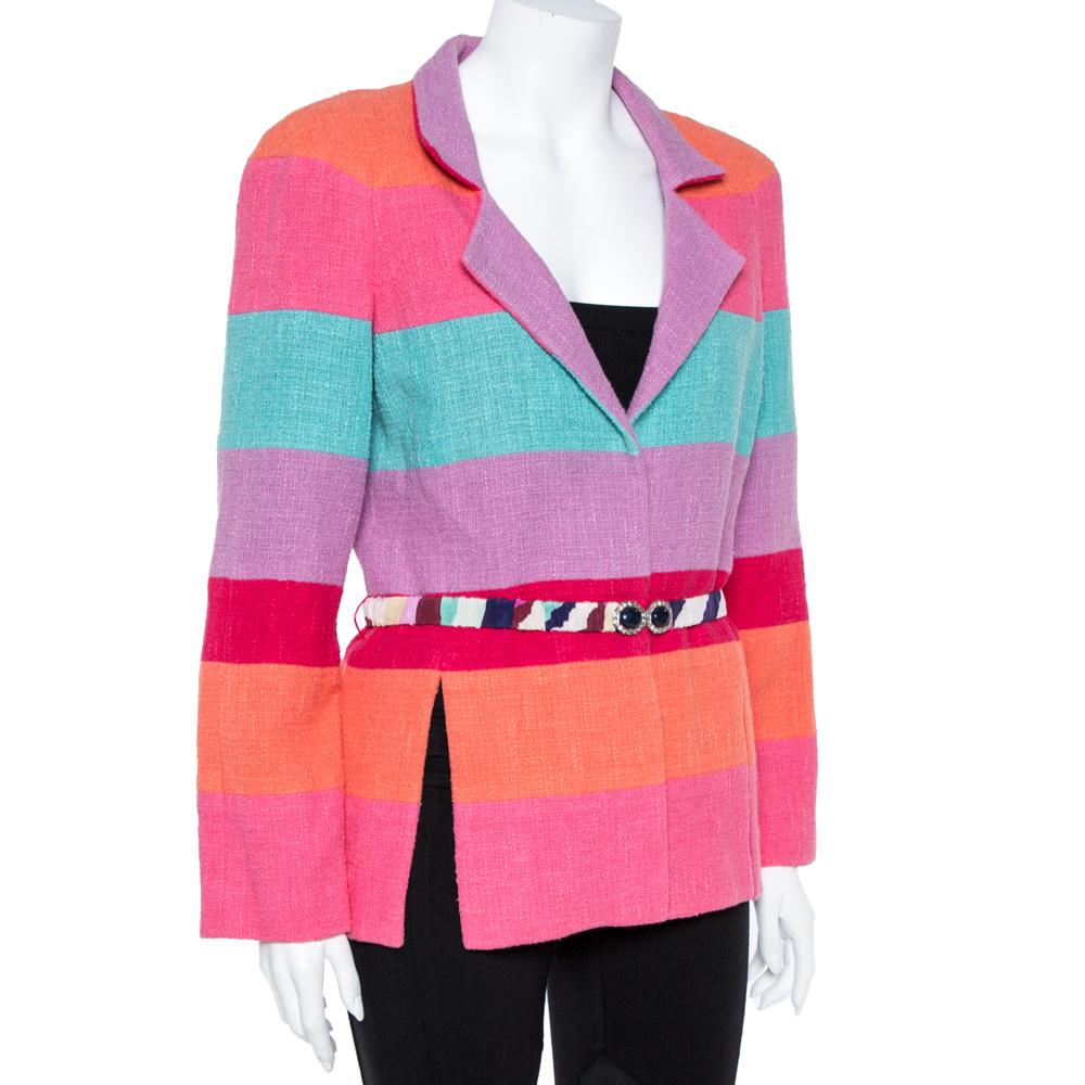 Fashioned in a contemporary design, this blazer from Chanel is a must-have! It is made of a cotton blend and styled with multicolor stripes. It flaunts notched lapels, a studded belt on the waist, and long sleeves. It is equipped with two vents and